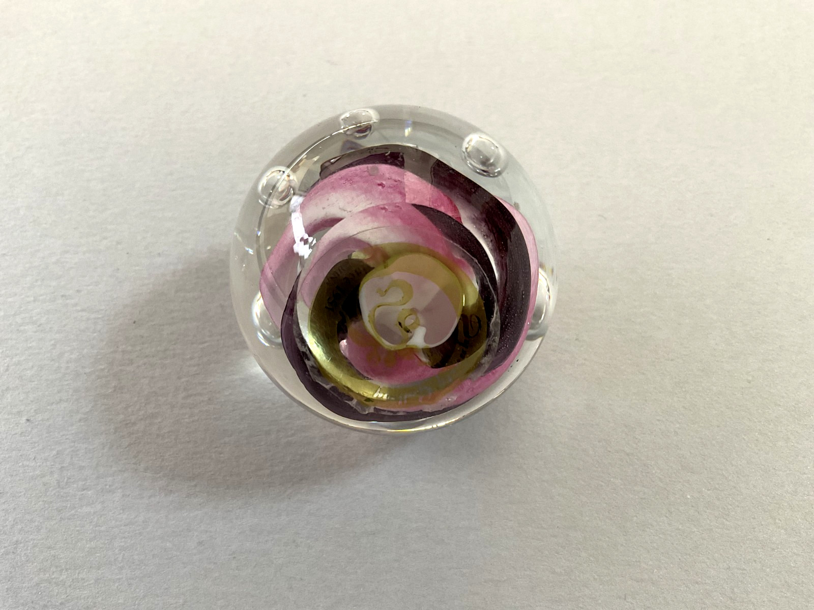 A Nice Glass Round Shaped Paperweight with Bubbles Approx. 2″ H x 2 1/4″ W