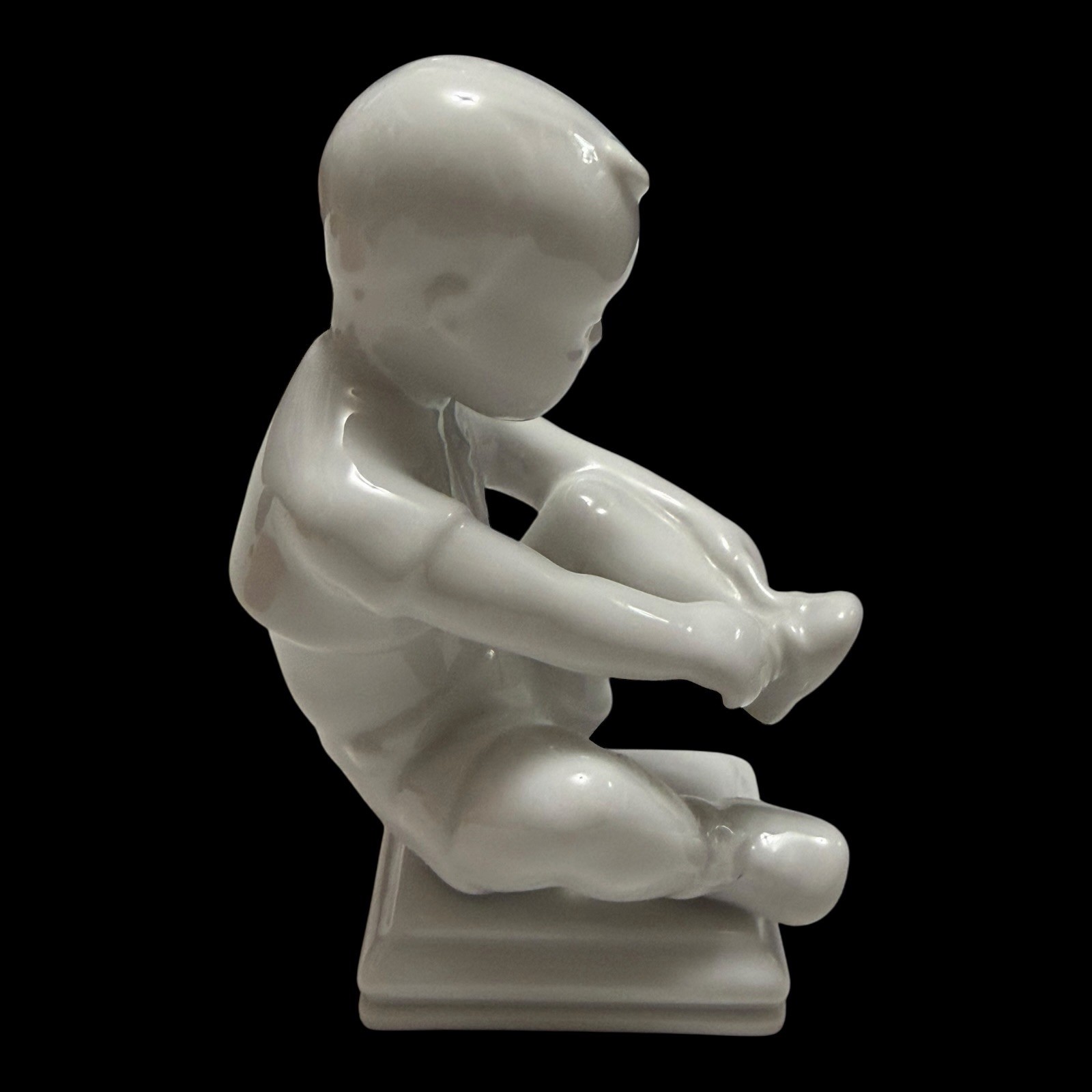 Rorstrand Bjurstrom Little Lasse Boy Putting on His Shoe Porcelain Figurine