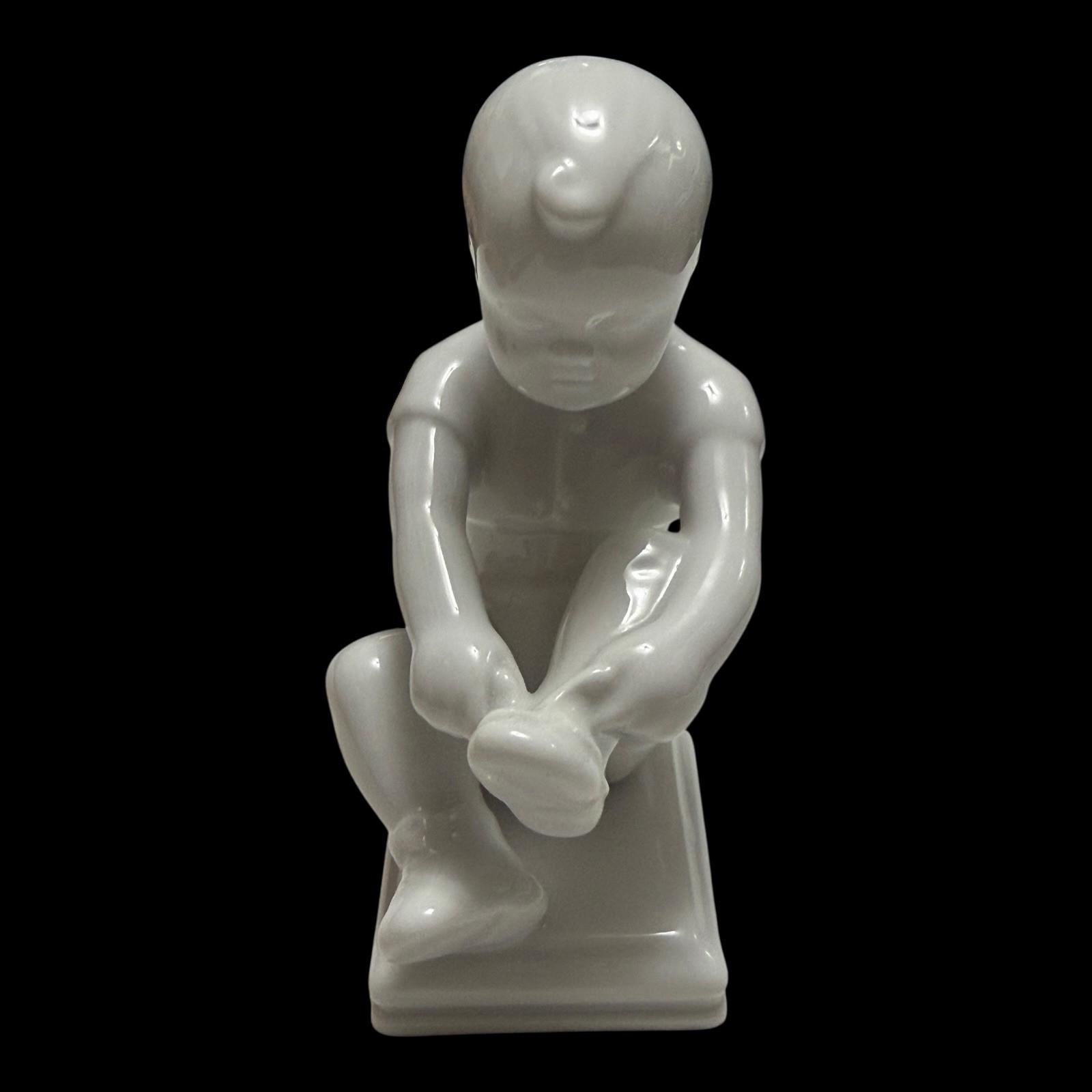 Rorstrand Bjurstrom Little Lasse Boy Putting on His Shoe Porcelain Figurine