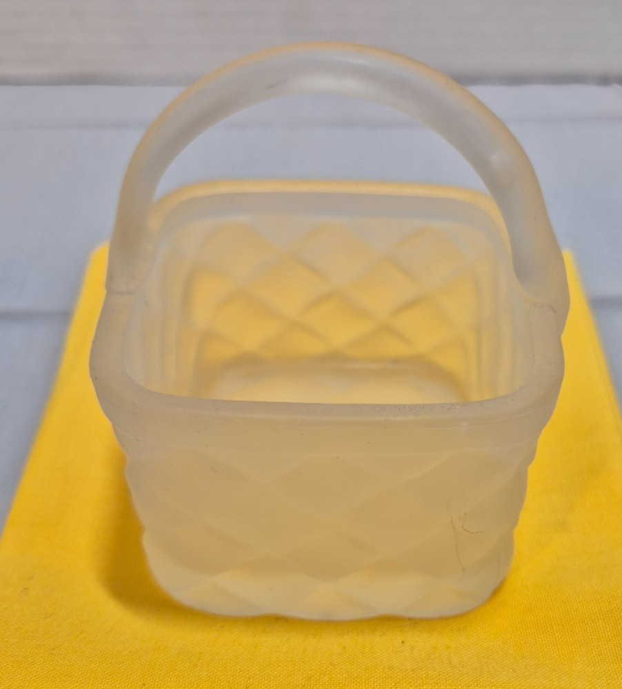 Set of 2 glass baskets. one clear and one opaque. 3 inch size with basket weave.