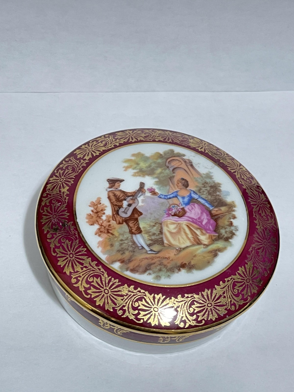 Vintage Limoges France Porcelain Trinket Box Red Gold Courting Scene 3.75″ Round