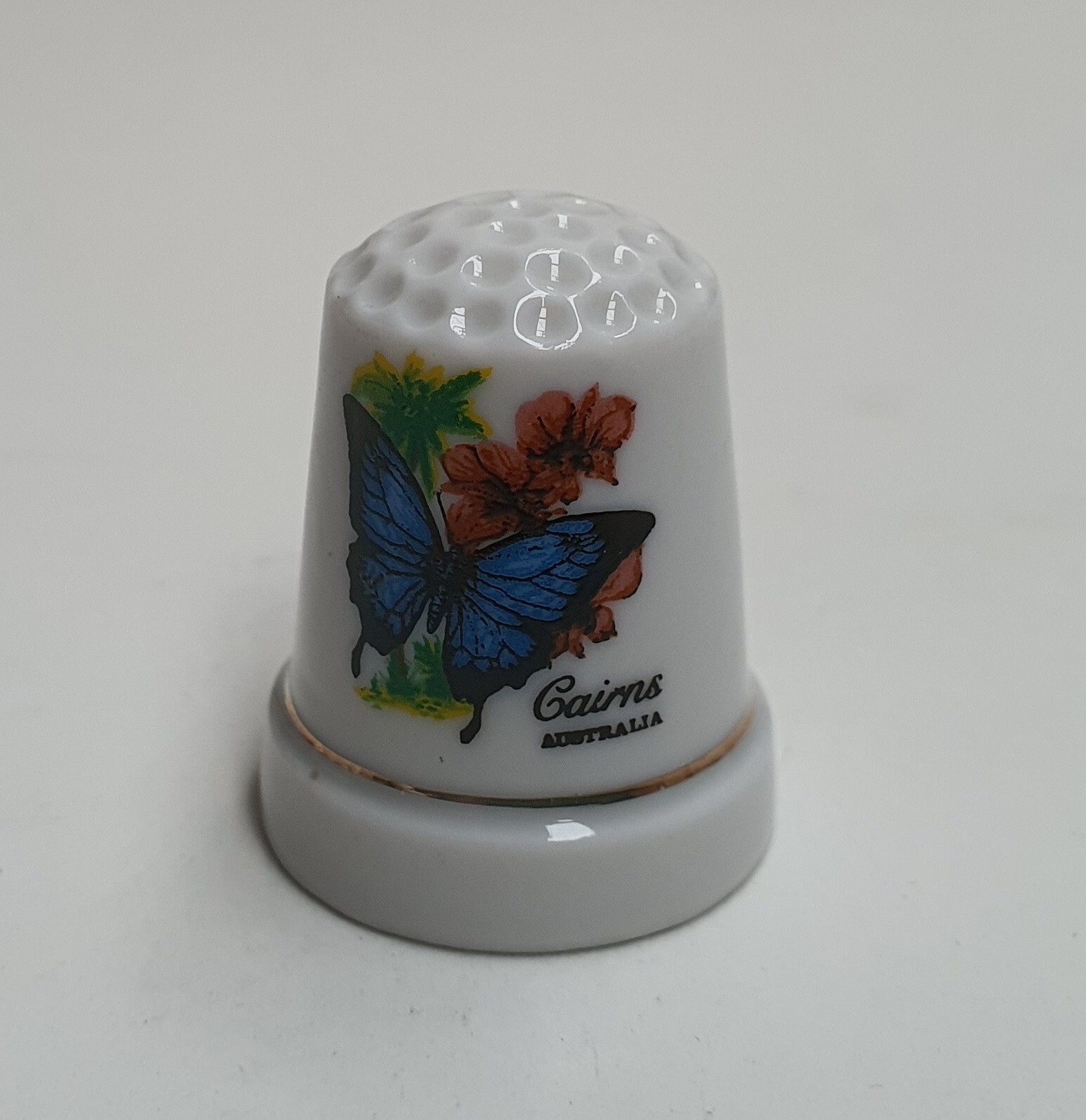 Porcelain Souvenir of Cairns Australia Thimble 3cm Tall Butterfly and Orchid