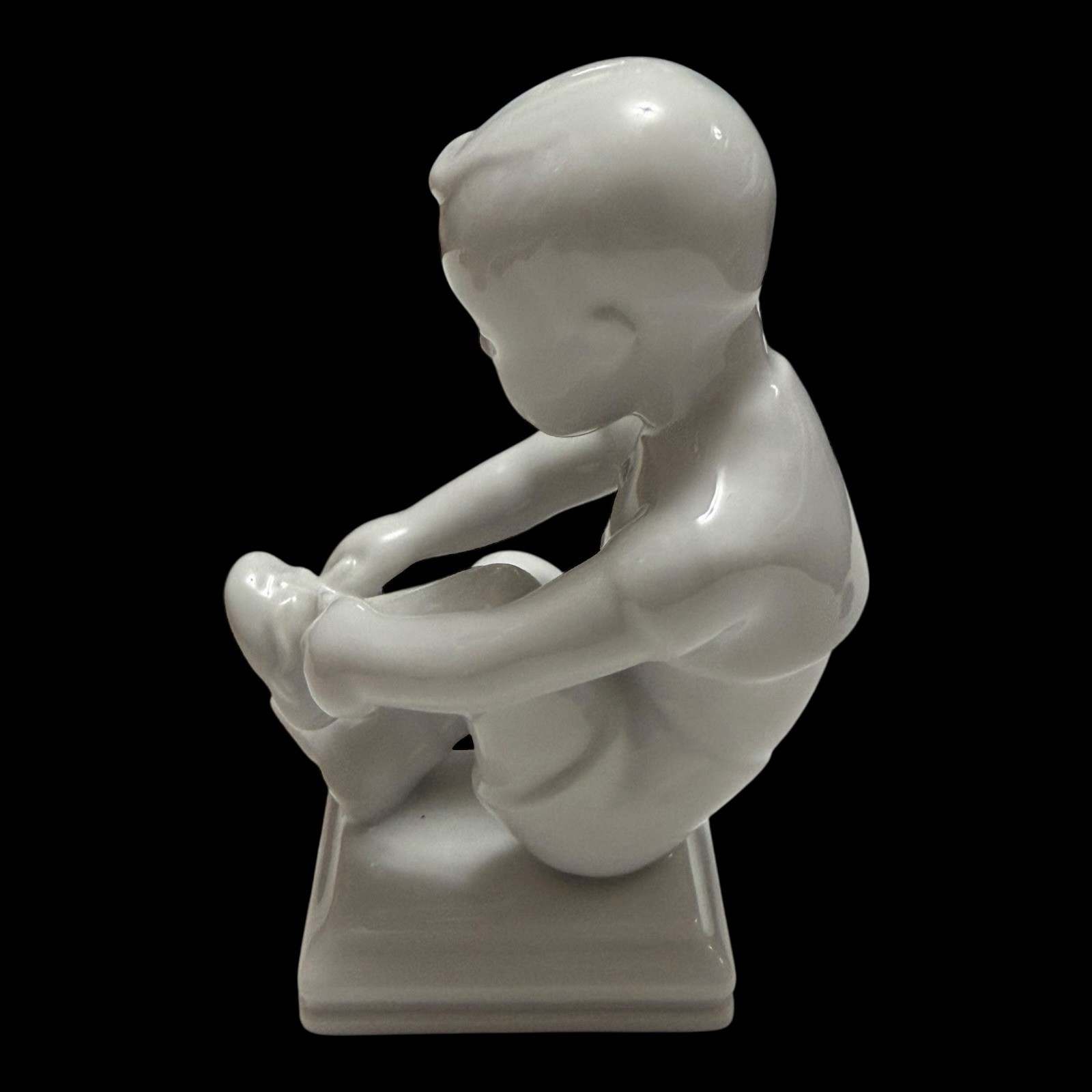 Rorstrand Bjurstrom Little Lasse Boy Putting on His Shoe Porcelain Figurine