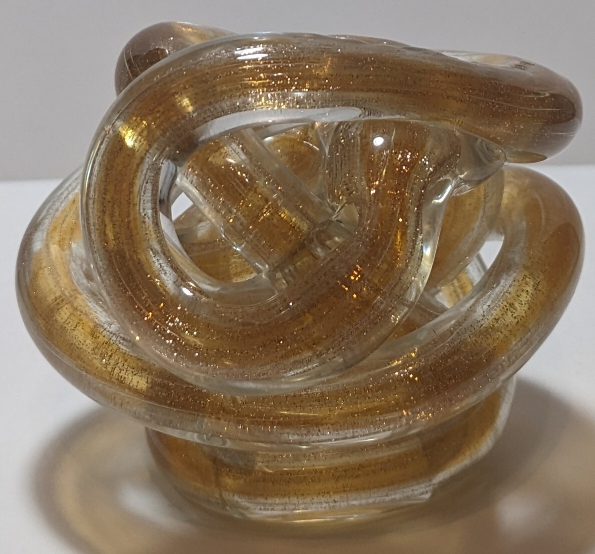 Amber Orange Gold Flake Art Clear Glass Glitter Twist Infinity Knot Paperweight