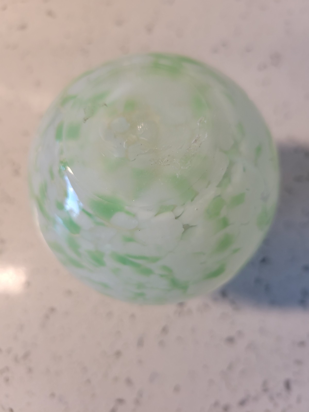 green and white splatter design art glass vase