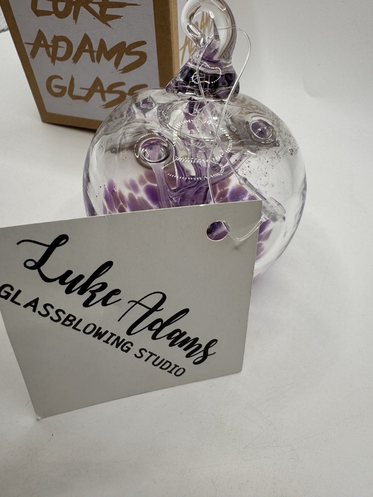 Luke Adams Handblown Glass “Good Thoughts” Ornament Purple Signed w/ Box & Tag