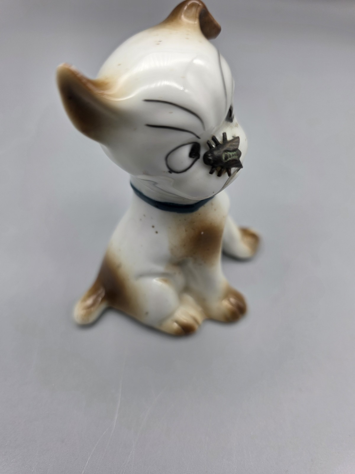 Vintage Porcelain Puppy Dog Figurine W Fly on Nose Brown Speckled Germany #5562