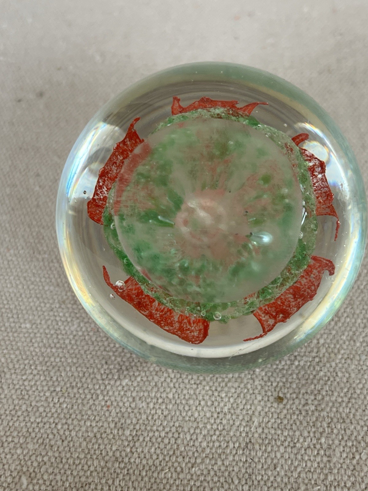 Art Glass Paperweight with Orange and Green Flower