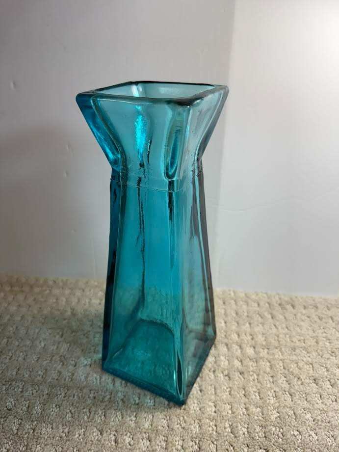 Glass Vase Blue 11 1/2″ tall, 3 3/4″ sq base 3.75lbs. Recycled glass.