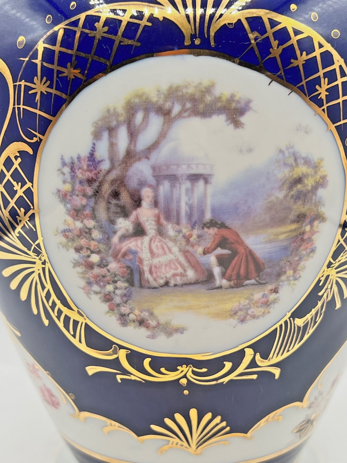 Fine Egyption porcelain vase with cobalt blue,gold,gilt, and pastoral scenes