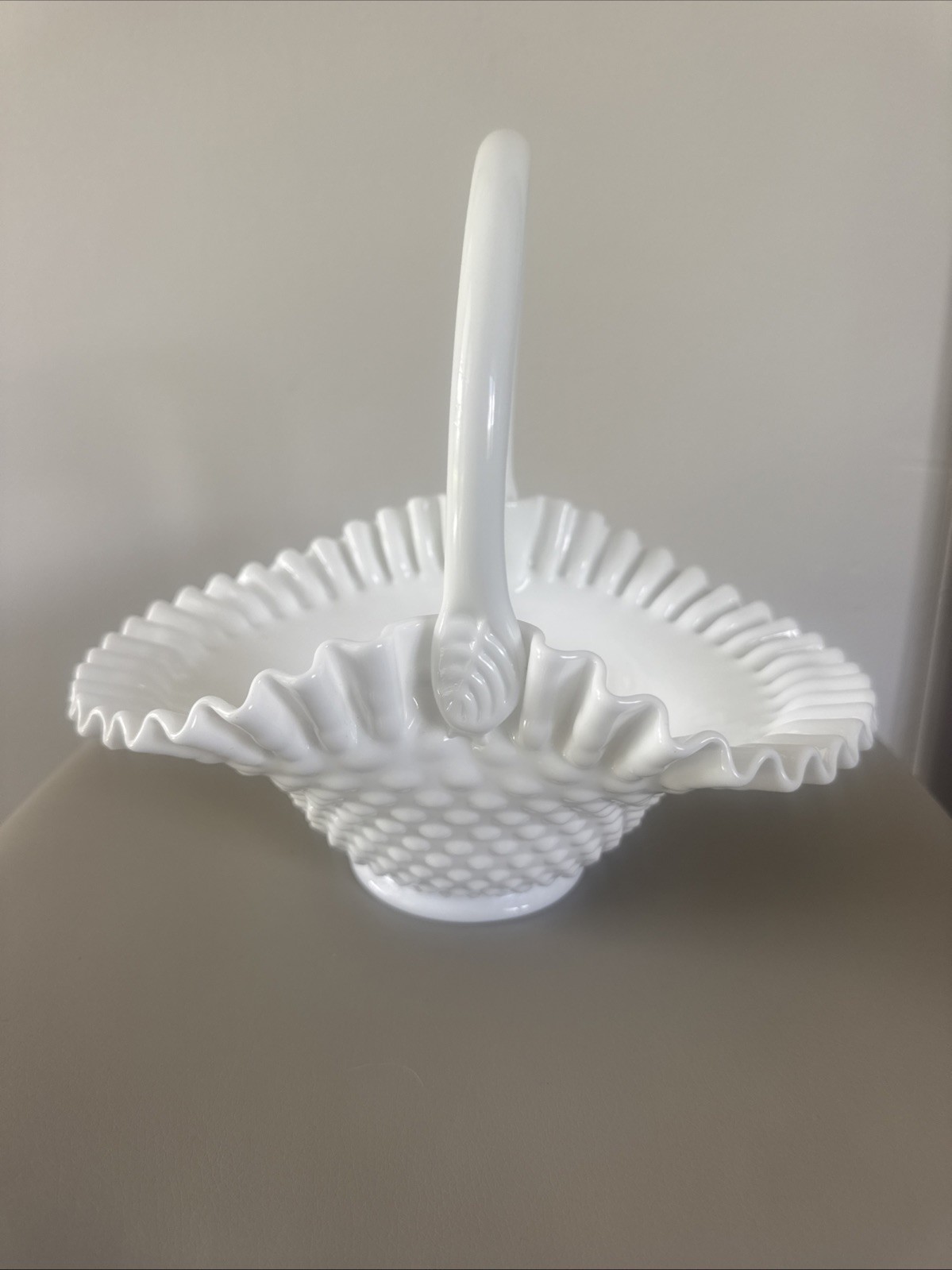 White Fenton Hobnail Milk Glass Basket with A Ruffled Rim. 10”L 4.5”T, 7”W