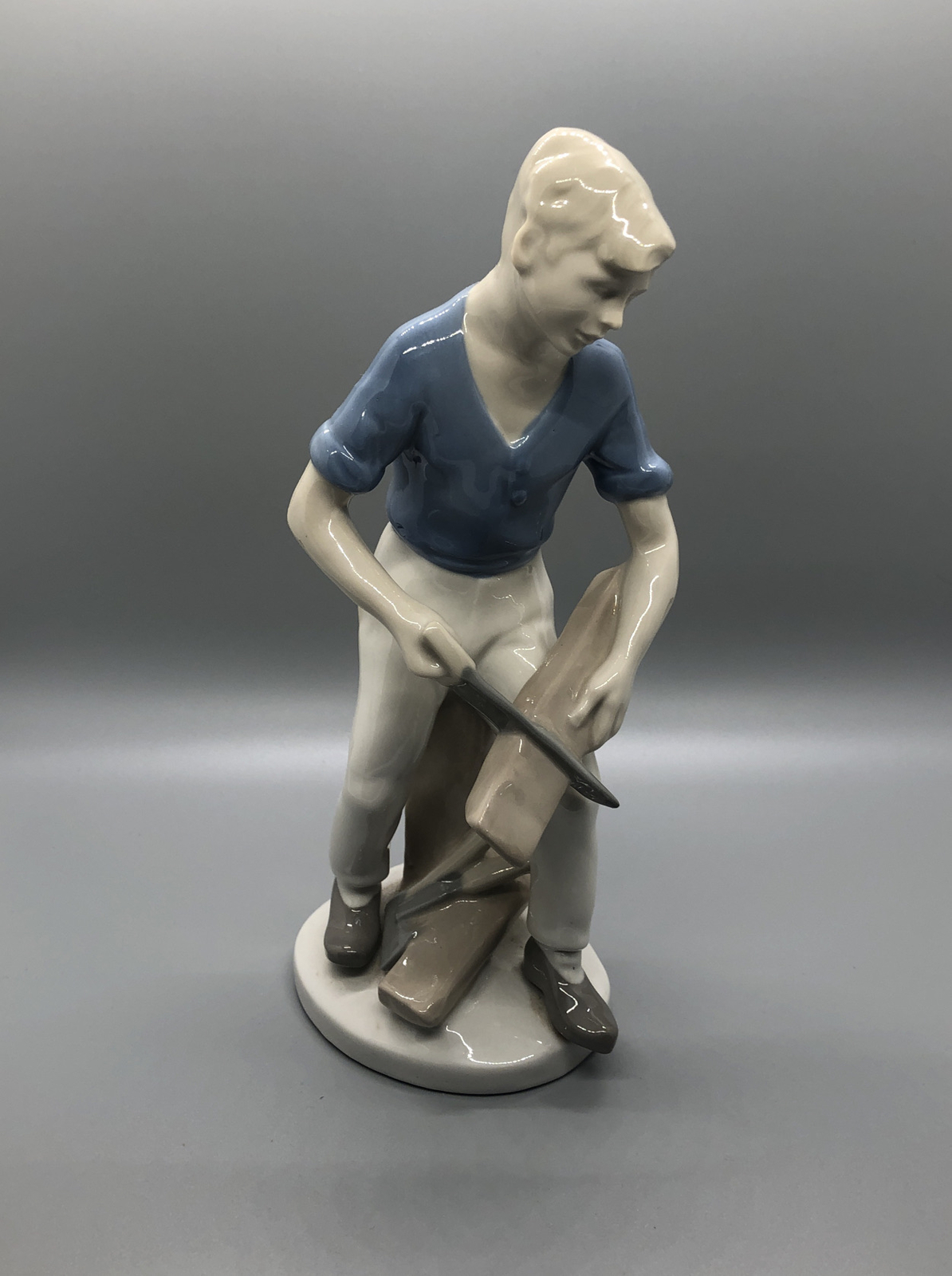 GDR Porcelain German Democratic Republic Boy Cutting Wood Figurine Vintage