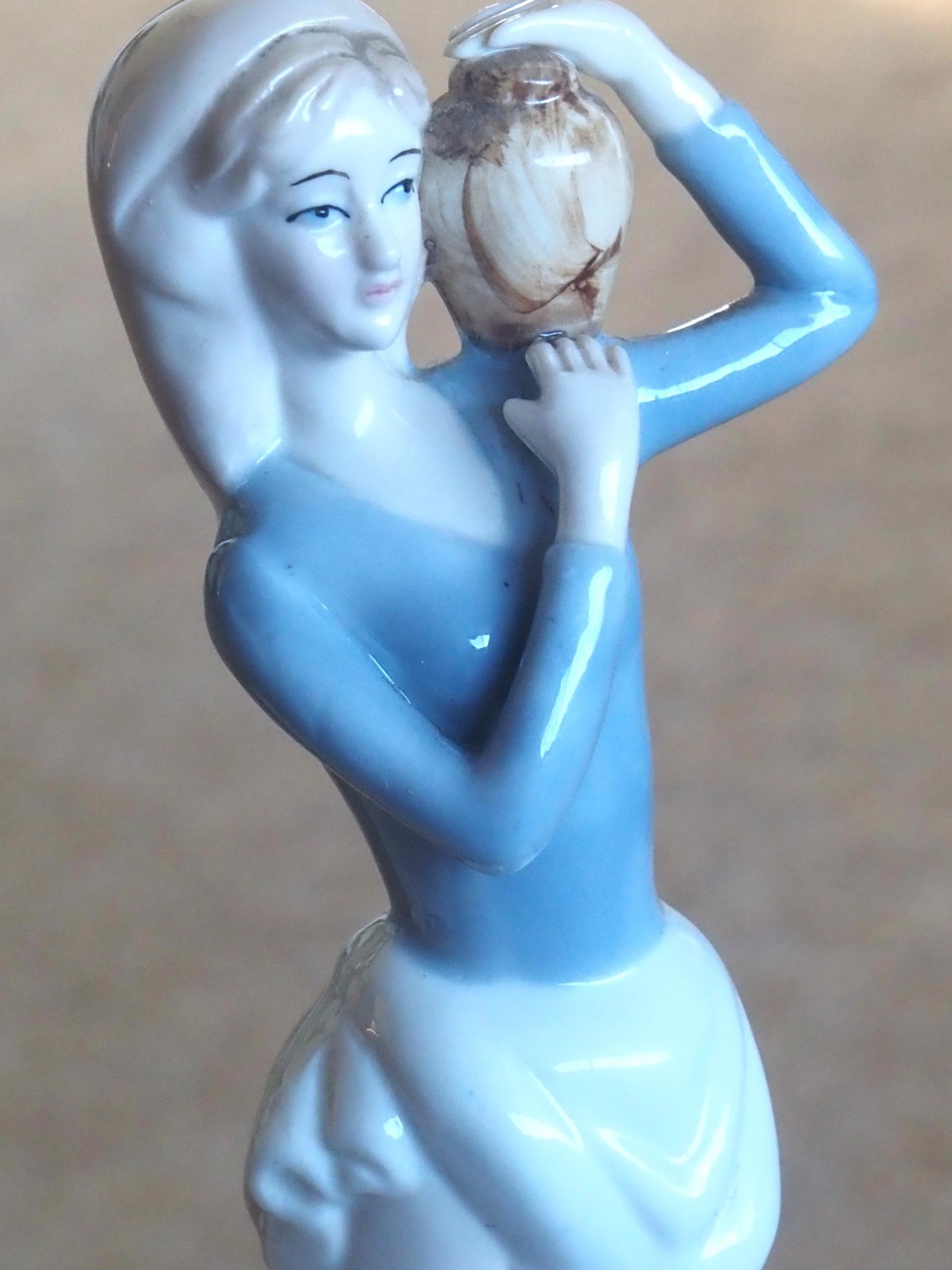 Figurine “Carlotta 1979” Lady with water vessel. 10.5″ Tall.