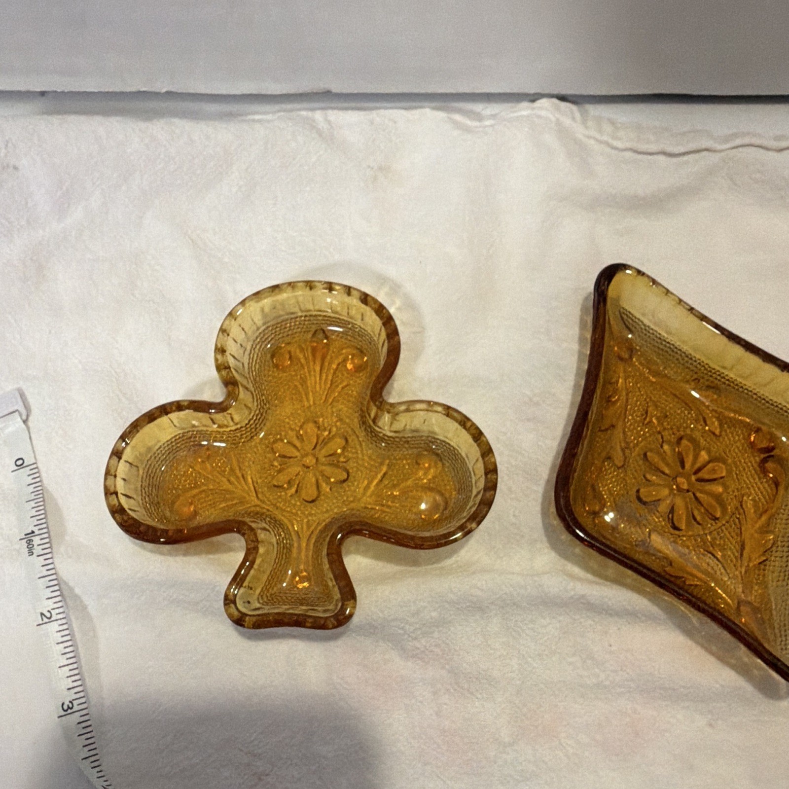 Lot of 2 Amber Pressed Glass Ashtrays Decorative Floral Theme Approx 4 in