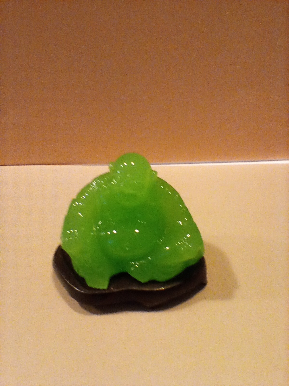 Smiling Buddha Green Colored Jade figurine Seated on Pedestal