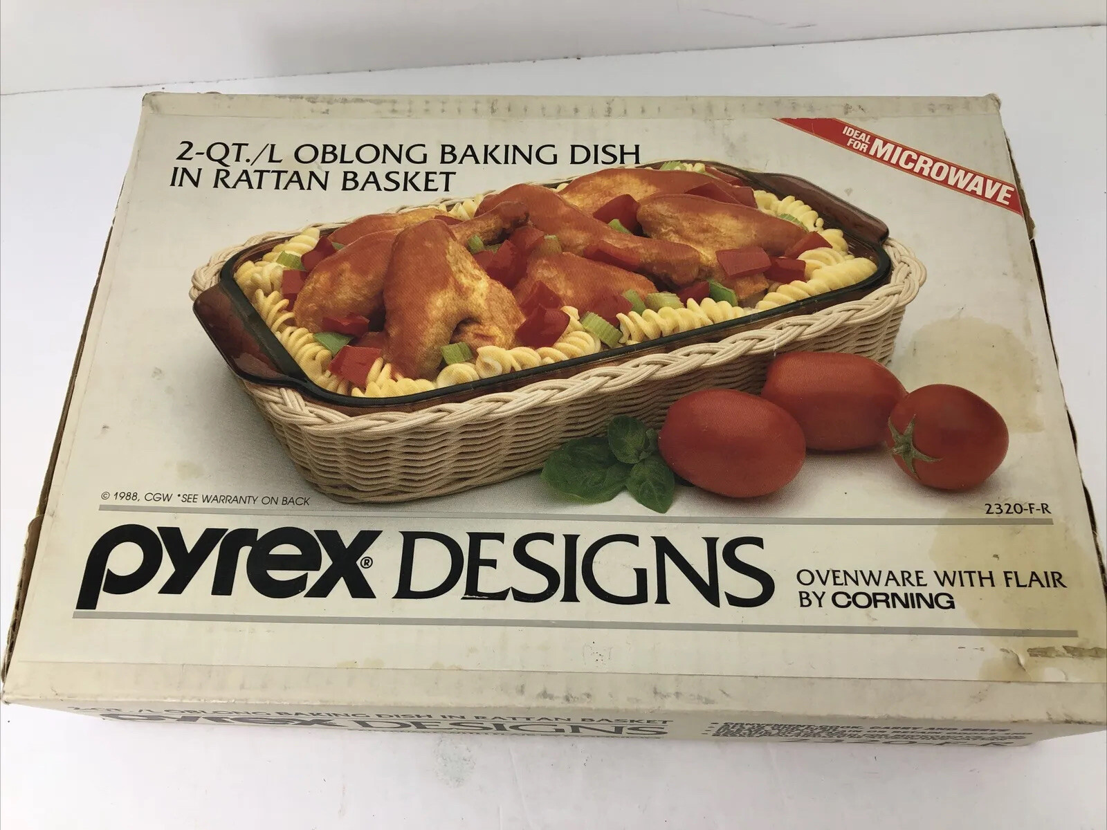 Vintage Pyrex Design 2QT. Oblong Baking Dish (clear)in Rattan Basket 2320-F-R.