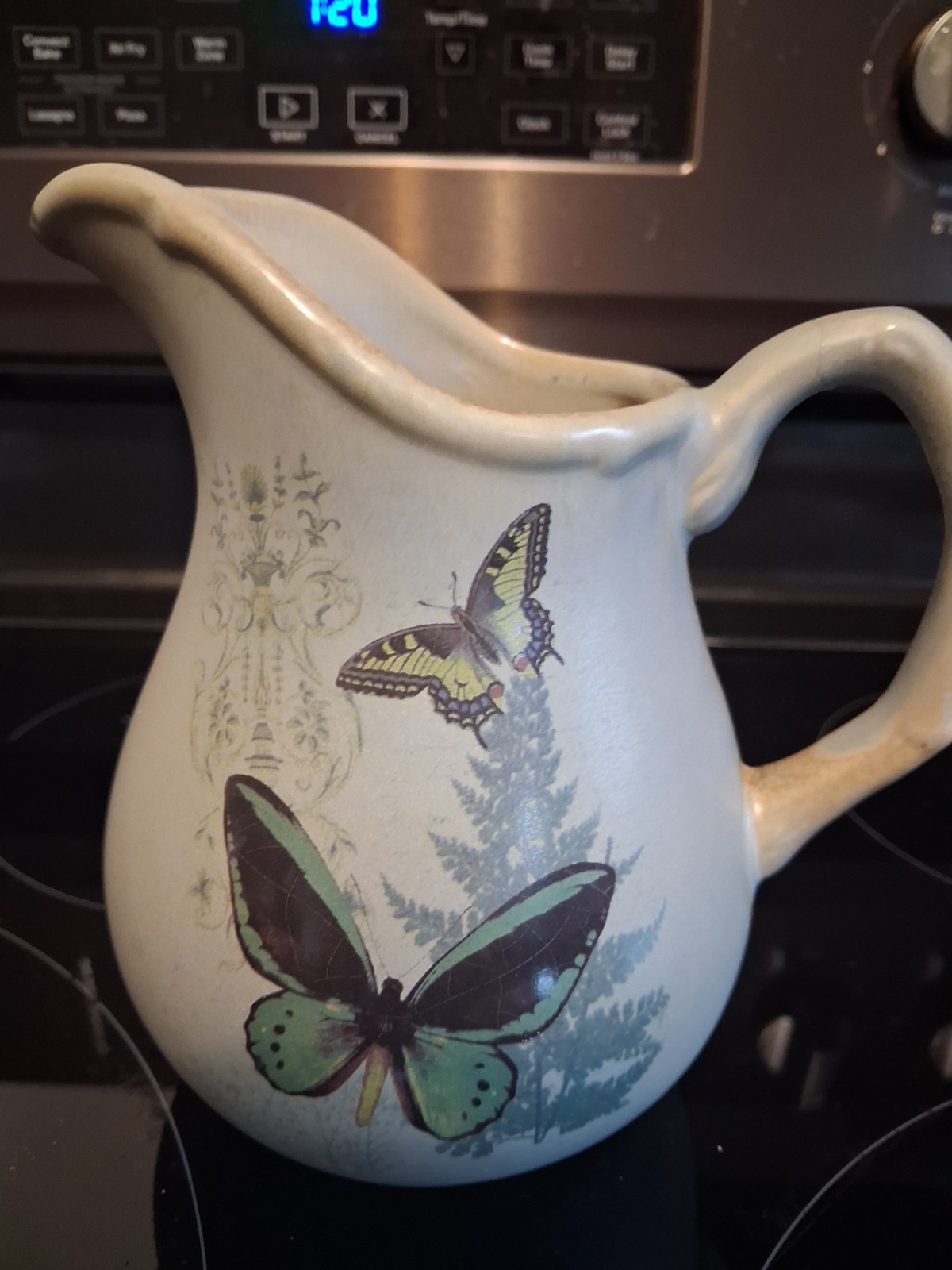 Butterfly pitcher vase light blue pottery vintage
