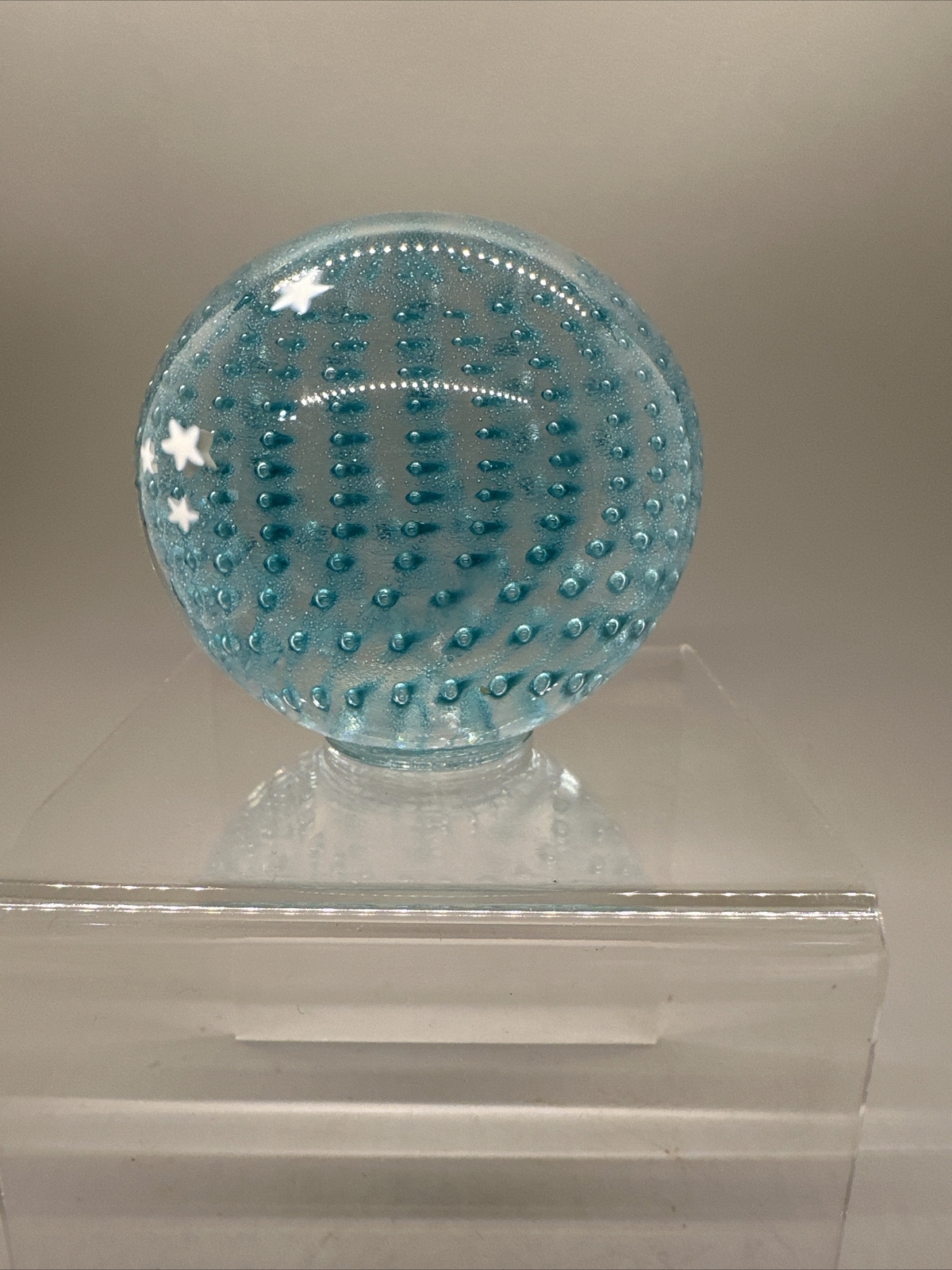 SIGNED EPIPHANY 2023 HAND BLOWN CLEAR AND BLUE PAPERWEIGHT WITH STARS