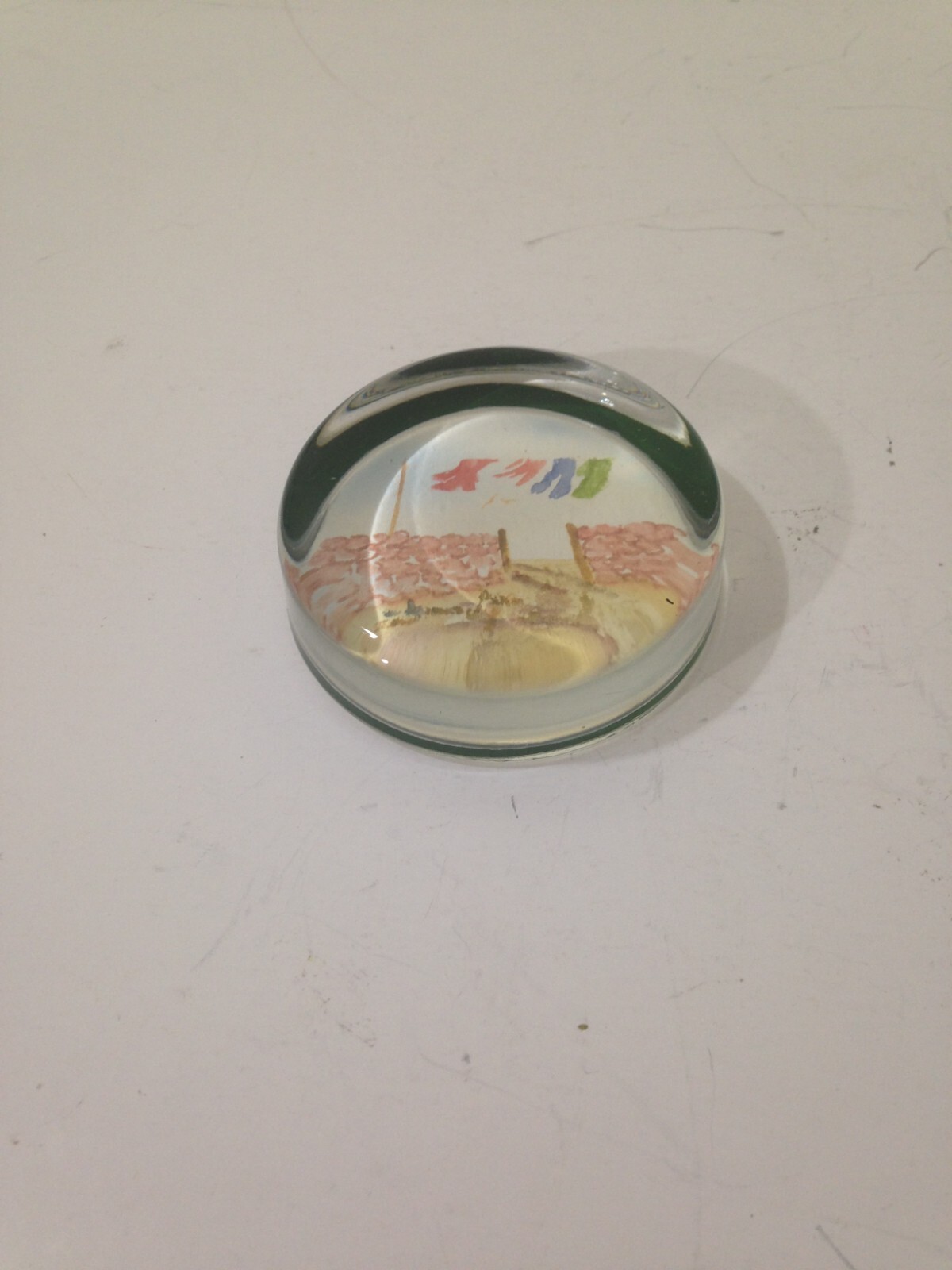Vintage glass paperweight with water color abstract art drying clothes on line