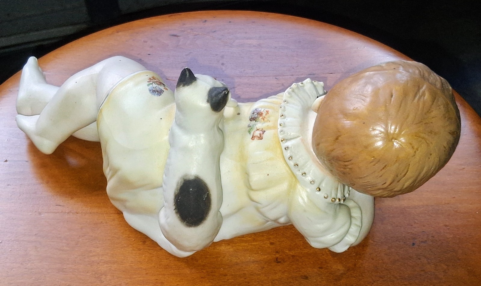 Antique Hertwig & Co. Piano Baby, Bisque Figurine, Baby w/Cat & Pacifier, 11″ L