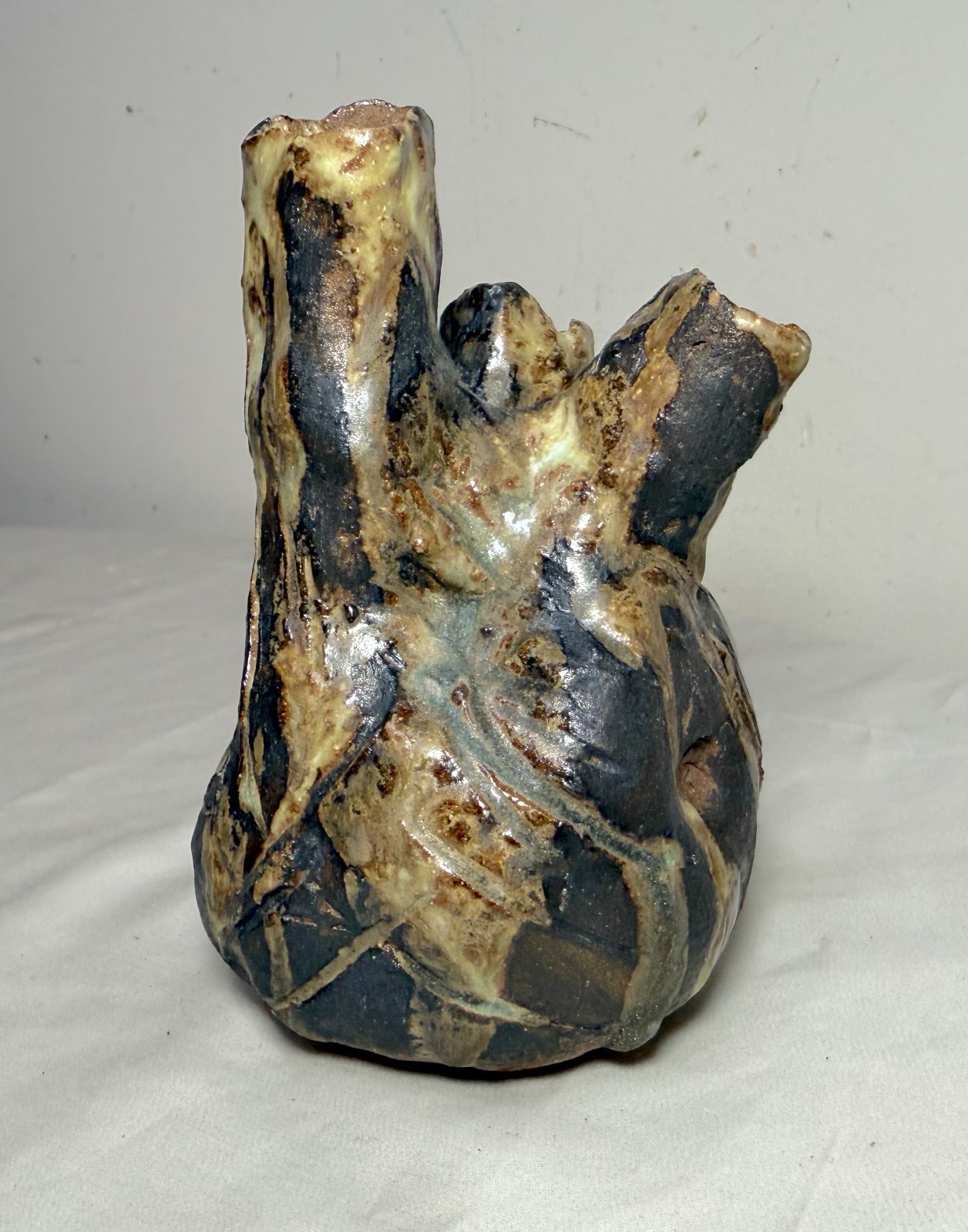Vintage handmade brutalist American pottery anatomical heart shaped vase