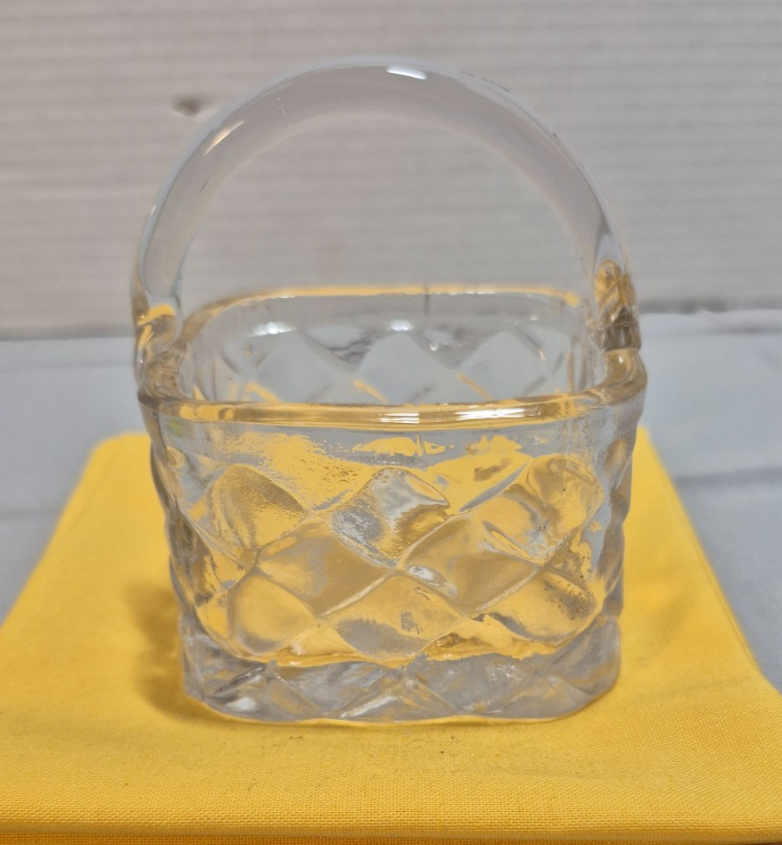 Set of 2 glass baskets. one clear and one opaque. 3 inch size with basket weave.