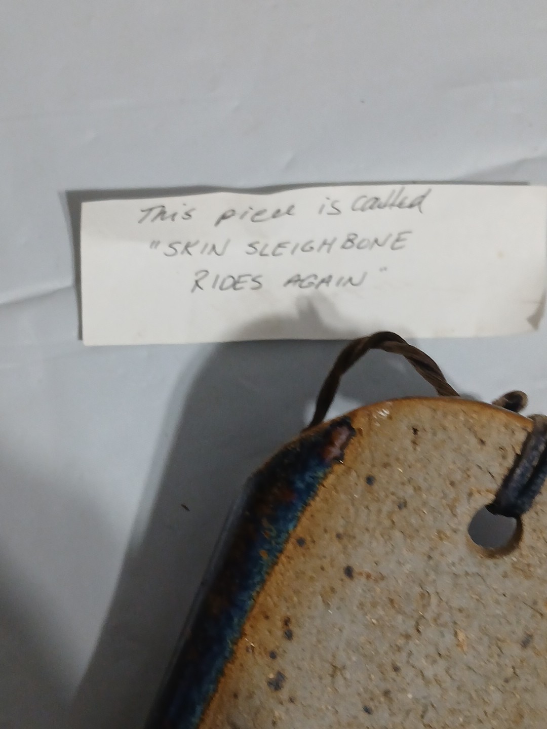 Art Pottery Wall Pocket W/attached Heart Called “Skin Sleigh bone rides again.”
