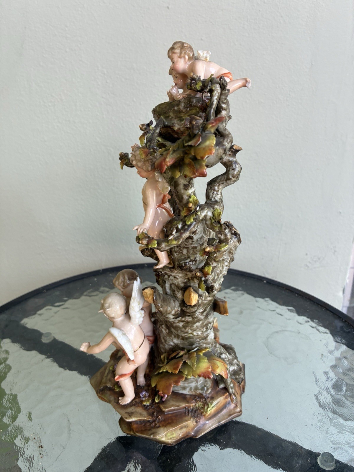 Volkstedt cherubs dancing in a tree and birds nest. 10” tall