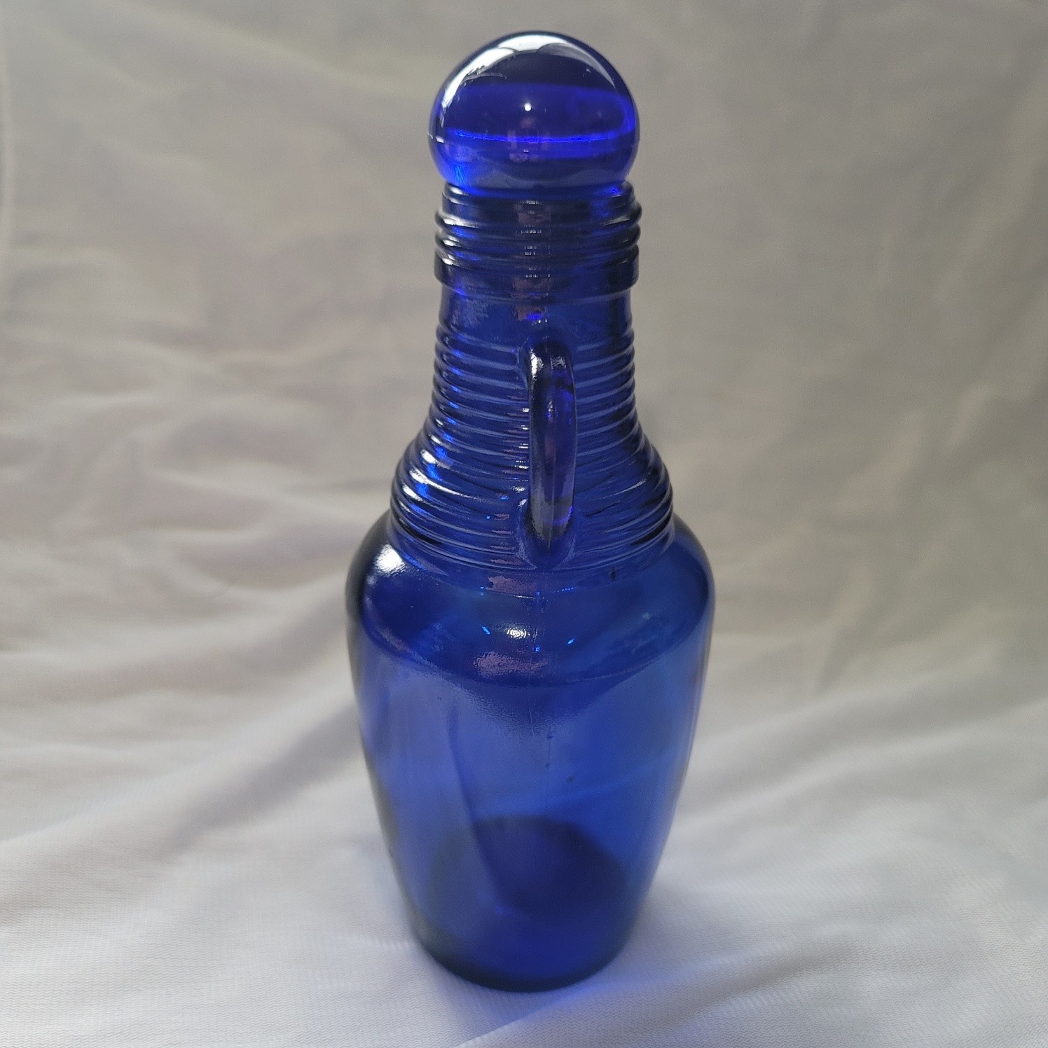 Vintage Cobalt Blue Glass Bottle Jug Style 7″ Tall with Rubber Cork Lid
