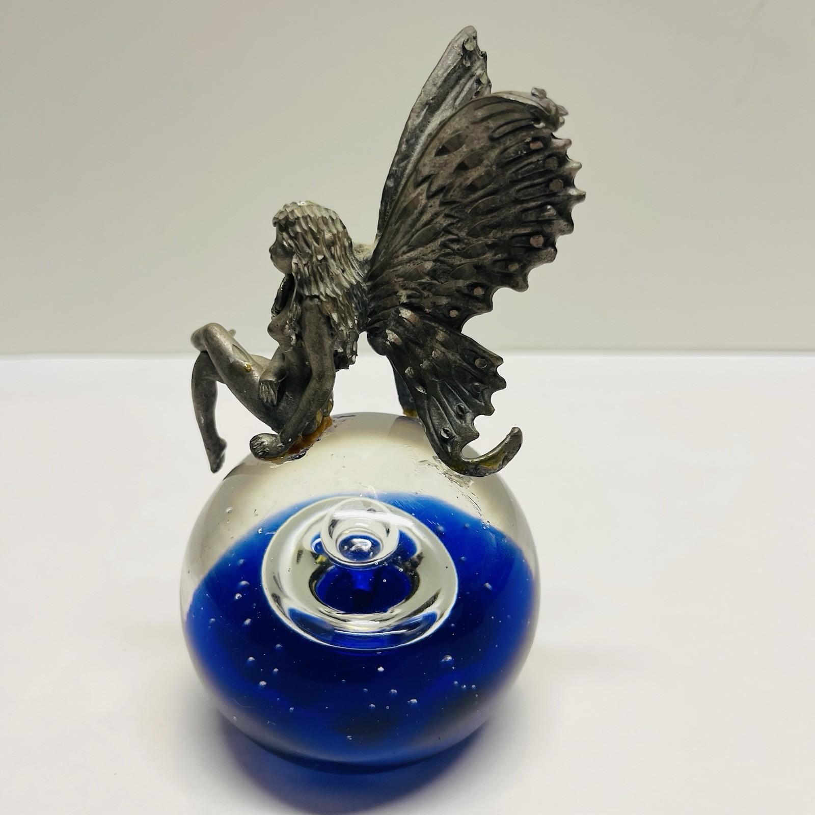 Pewter Fairy Sitting On Cobalt Blue Controlled Bubbles Art Glass Paper Weight