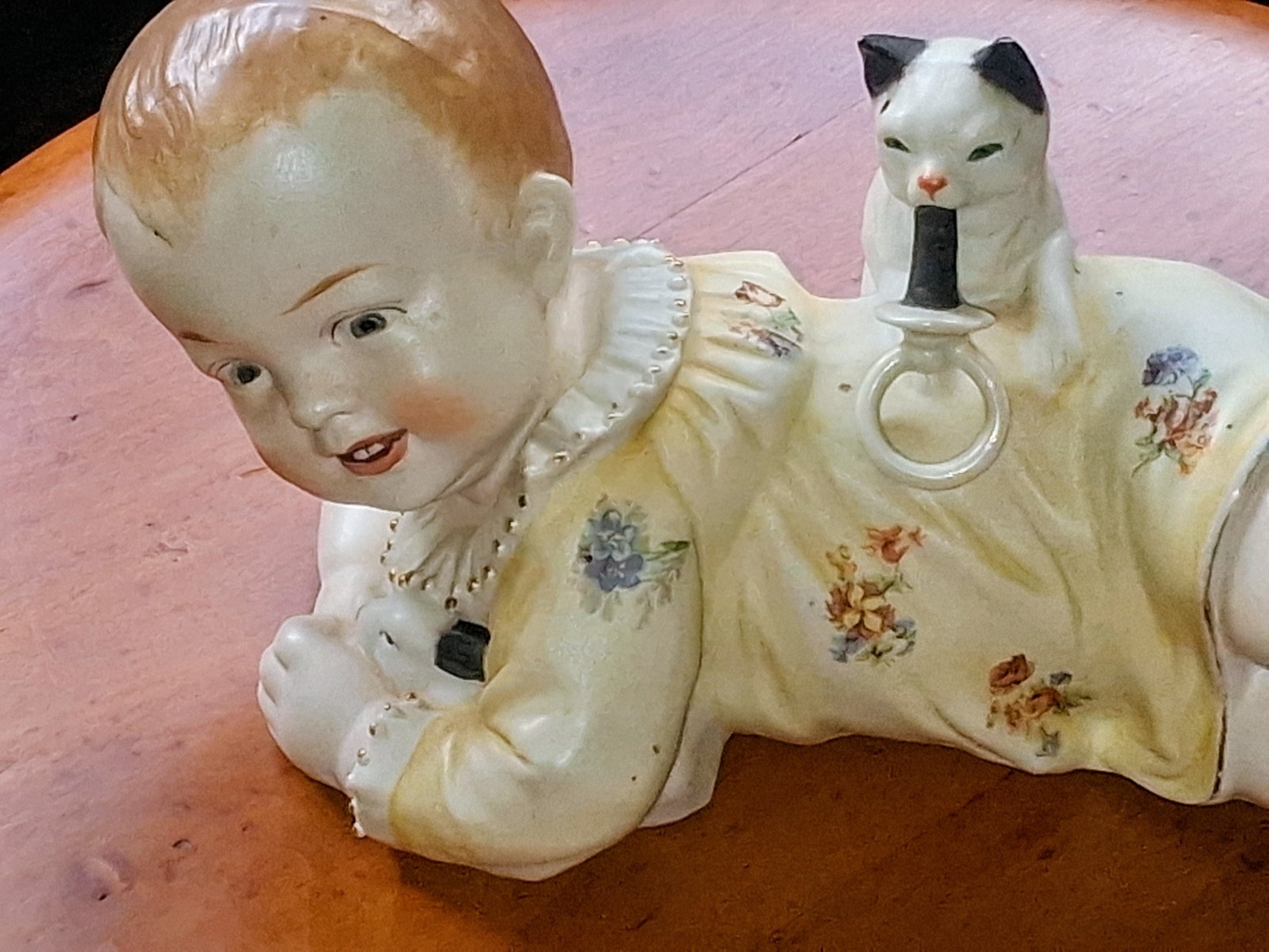 Antique Hertwig & Co. Piano Baby, Bisque Figurine, Baby w/Cat & Pacifier, 11″ L