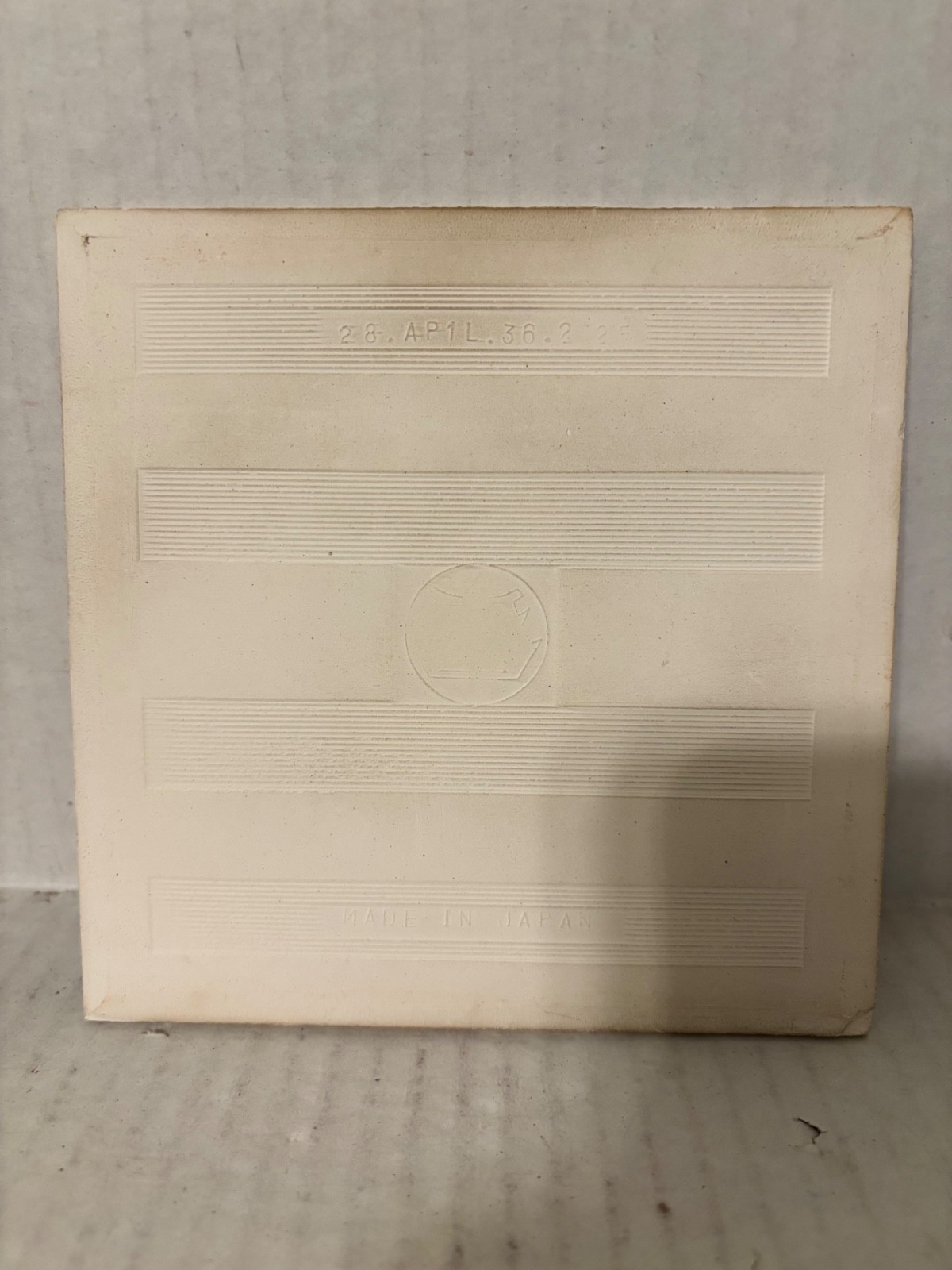 WHITE, BROWN, ORANGE AND BLACK DESIGN TILE MADE IN JAPAN 6″ SQUARE