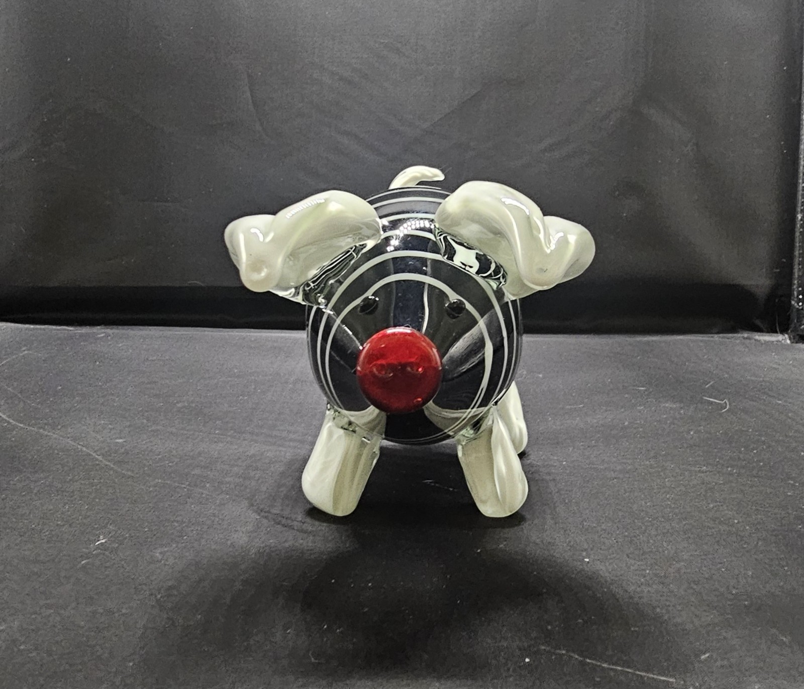 Hand-blown murano style striped art glass pig figurine w/red nose & white tusks.