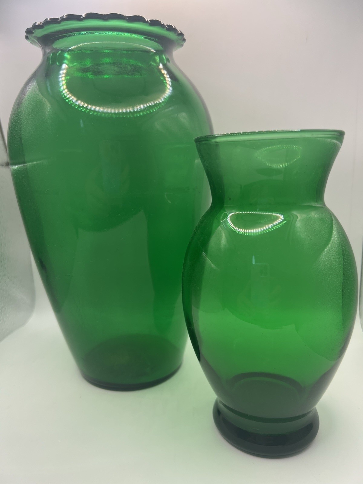 Set of 2 Mismatched Unbranded Green Glass Vases. Large 8.75” T, Small 6.25” Tall