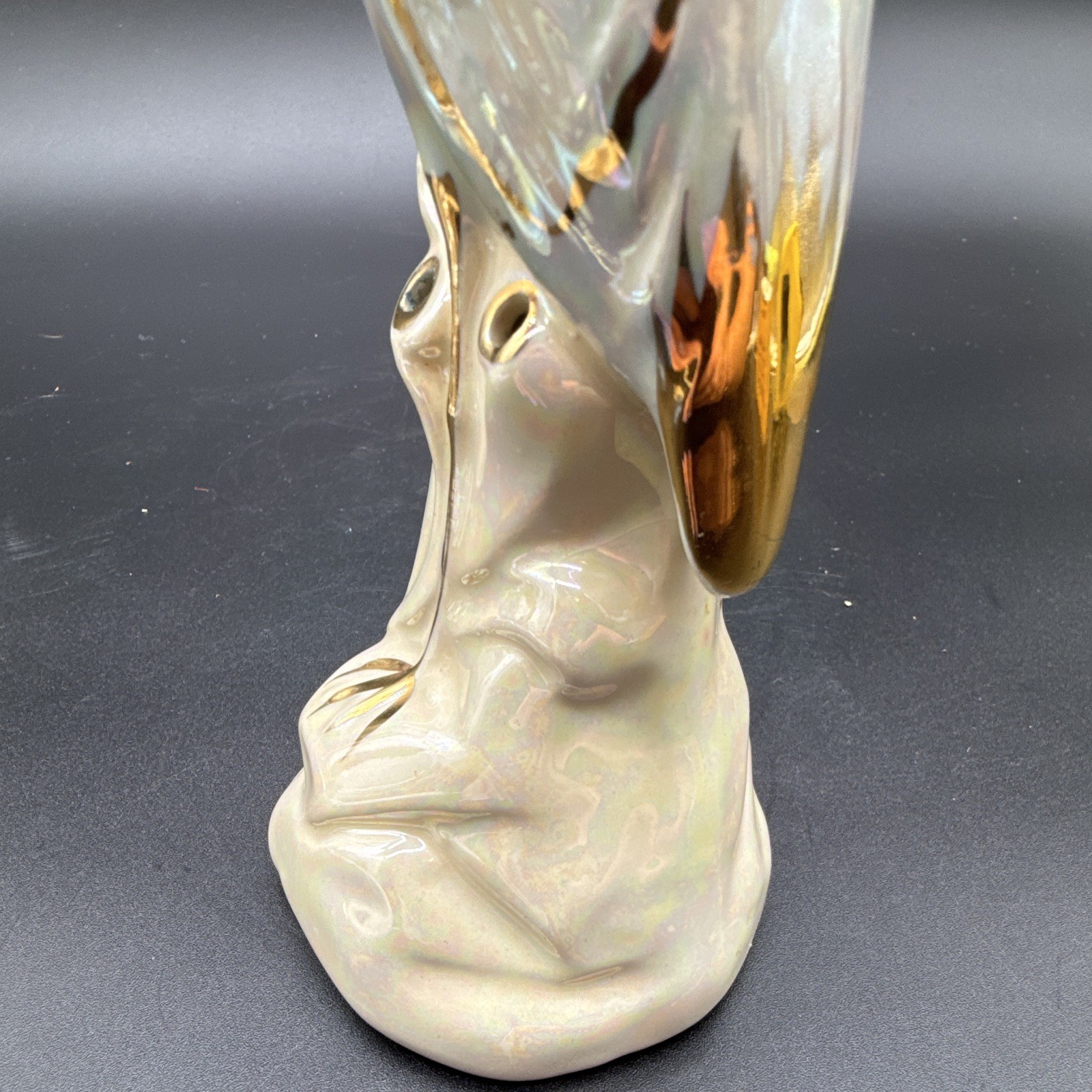 Iridescent white & gold ceramic pelican figurine, glossy finish, 8 in