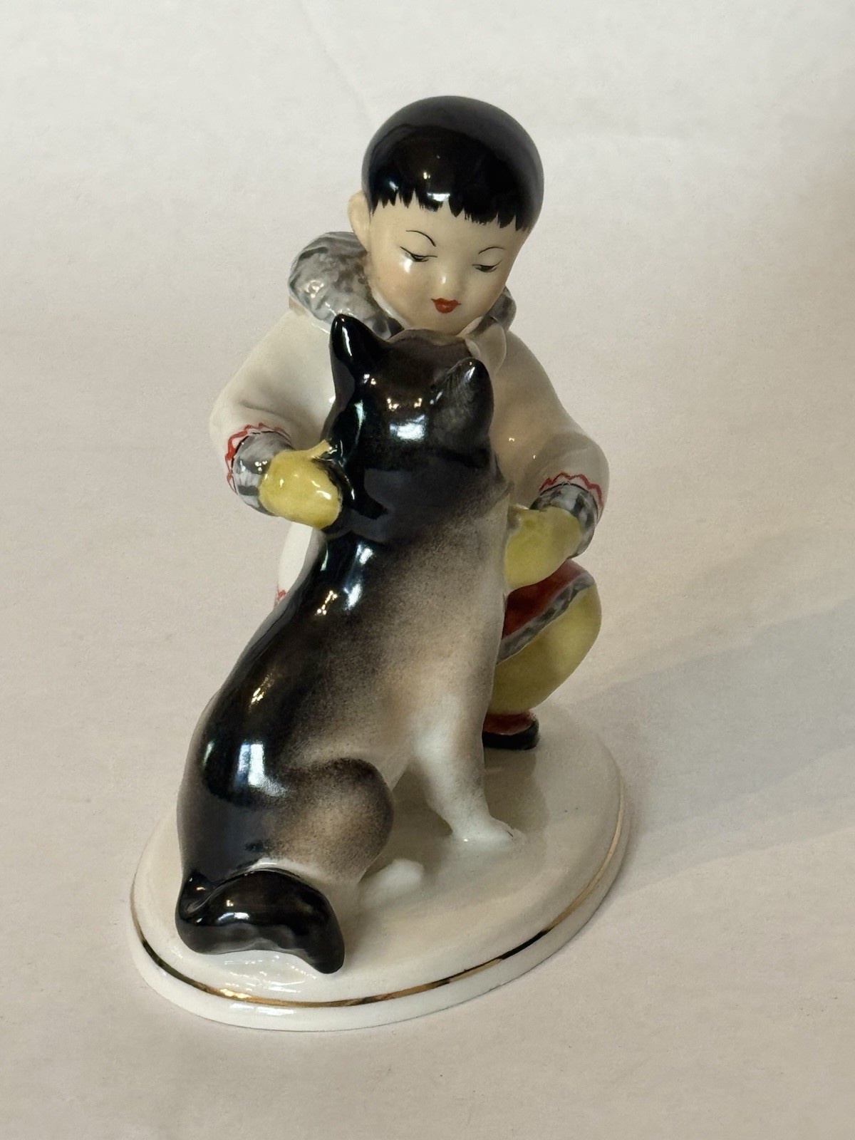Vintage LFZ Lomonosov USSR Russian Yakut Boy Child Husky Dog Porcelain Figurine