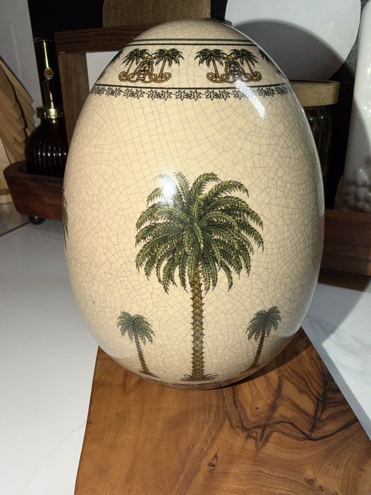 crackle glaze finish and a green palm tree motif