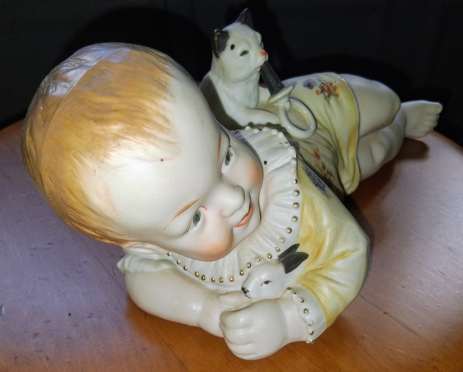 Antique Hertwig & Co. Piano Baby, Bisque Figurine, Baby w/Cat & Pacifier, 11″ L