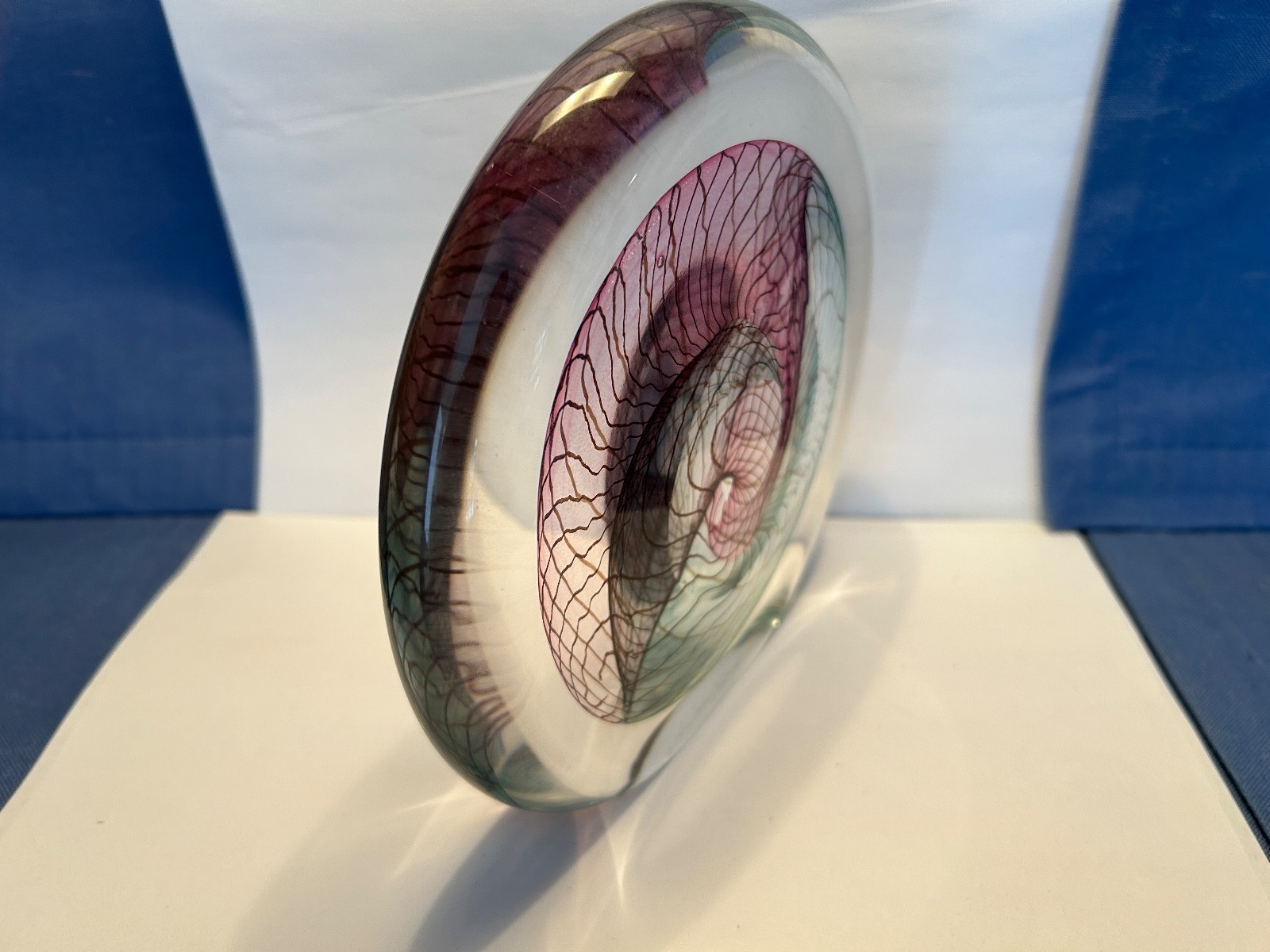 SIGNED ART GLASS FROM THE 1990S WITH PURPLE, GREENS AND LIGHT BROWN VEINING