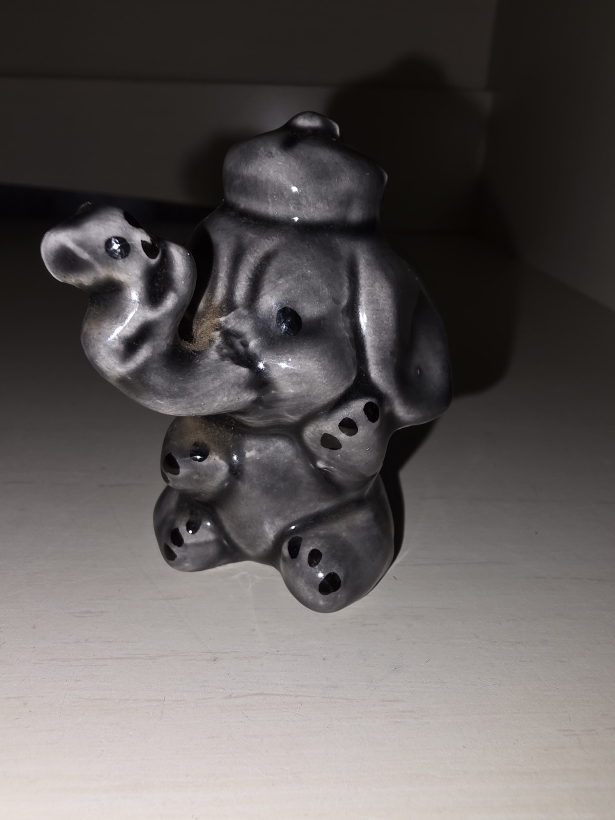 Vintage Elephant Wearing Hat Figurine. Trunk Up