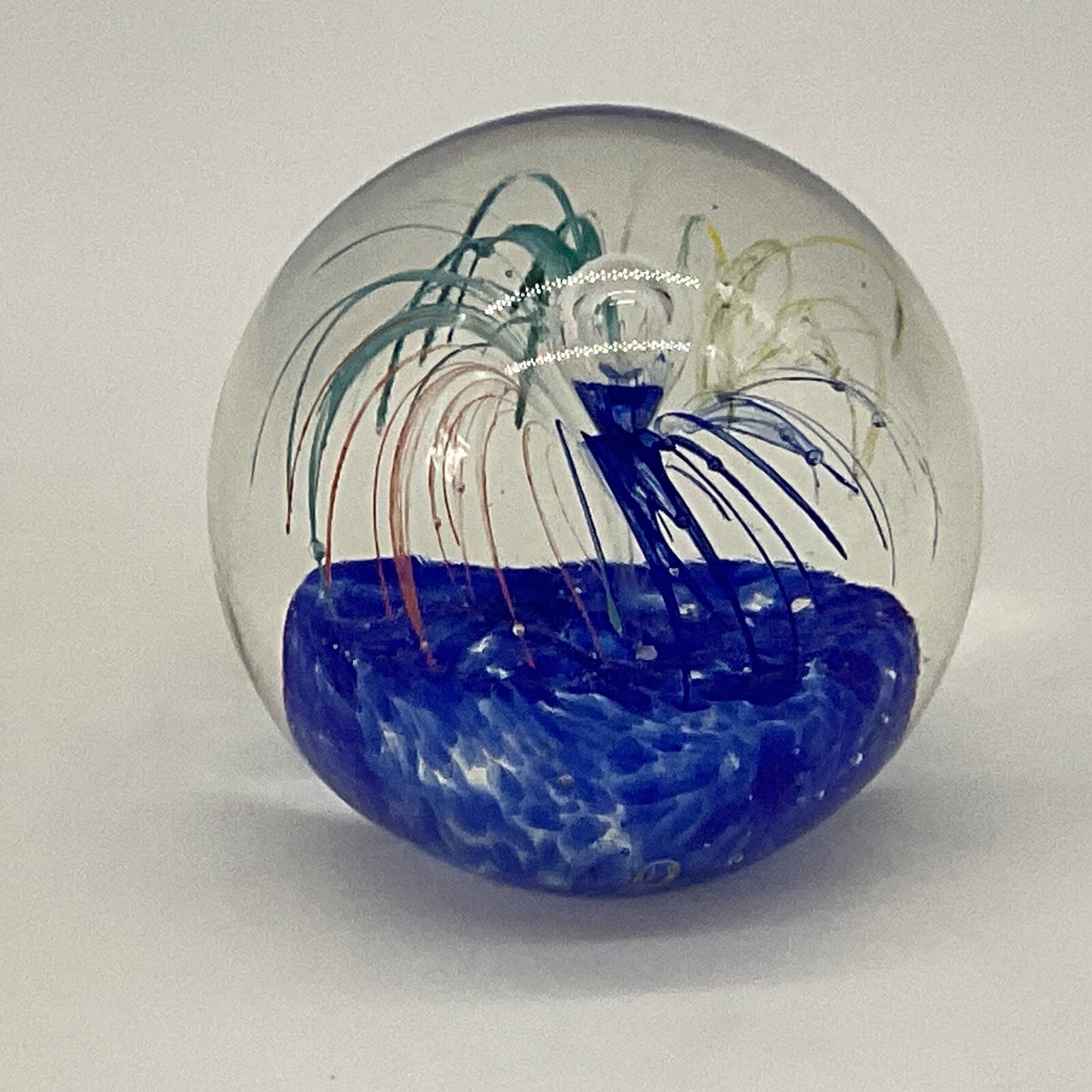 Glass Paperweight Blue Fountain With Blue, Green, Yelow And Orange 2×3