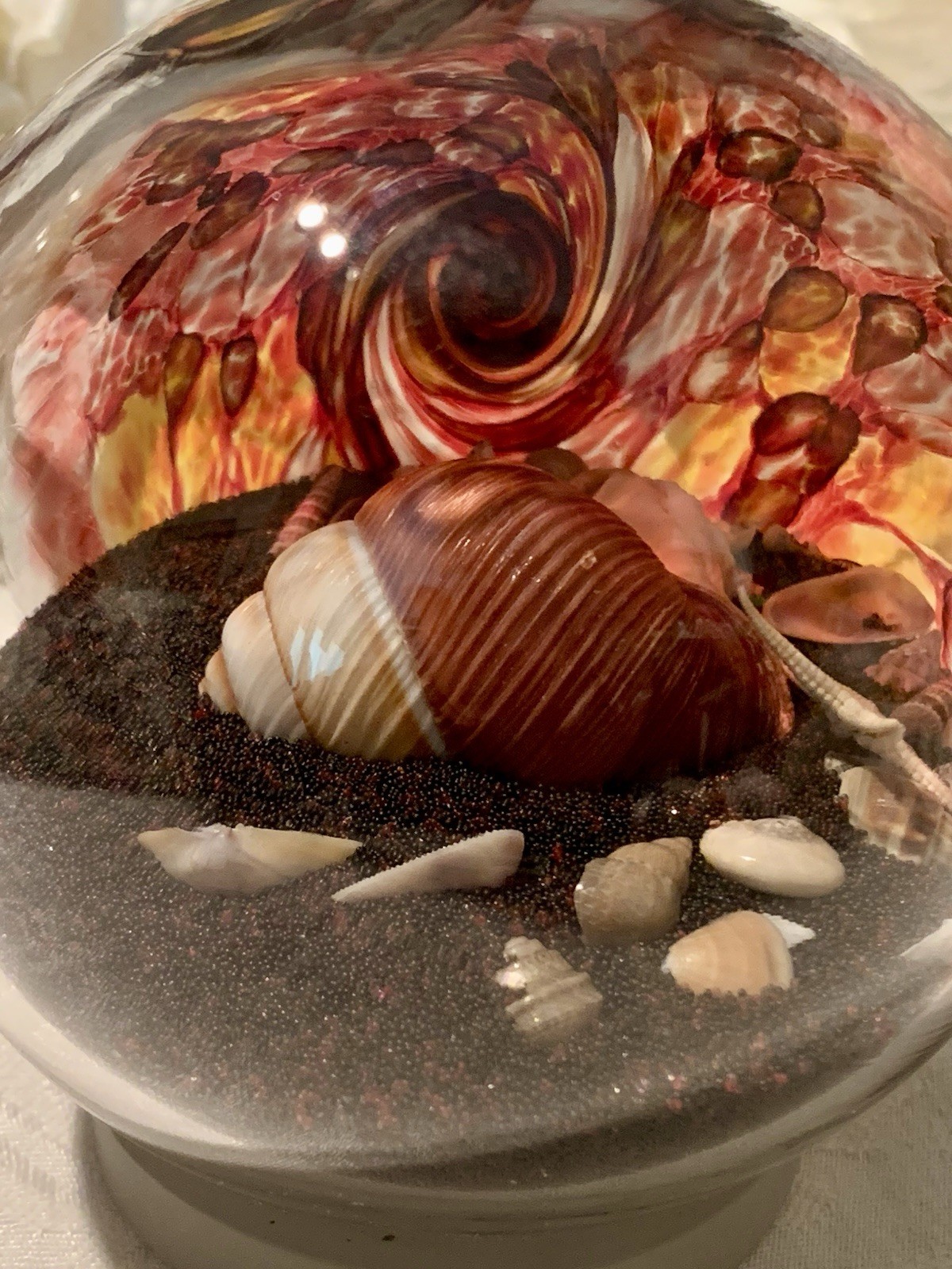 Art Glass Eye Studio Globe Sand & Sea Shells Paperweight Red Swirl 3 3/4”
