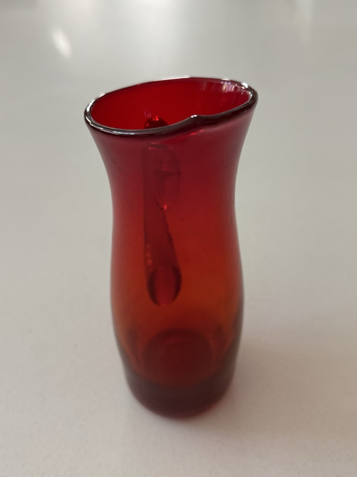 Vintage Small Amberina Glass Hand Blown Glowing Pitcher with Orange Handle 7.5”