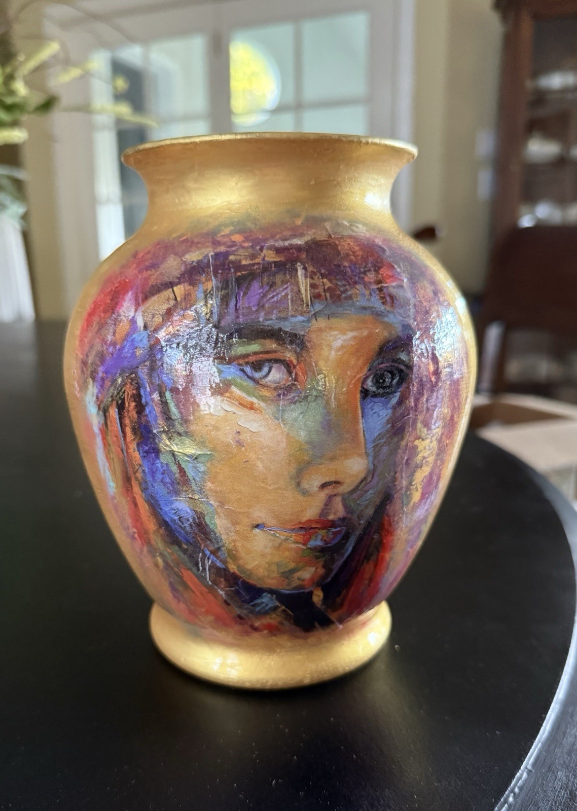 Beautiful Gold Vase Displaying a Beautiful face