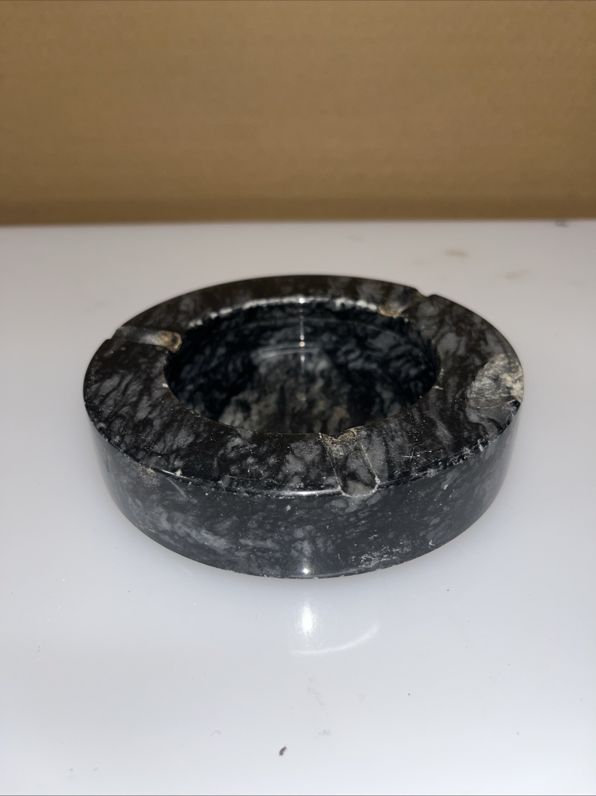 RARE FIND STONE ASHTRAY VERY HEAVY DUTY. BLACK AND GRAY ROUND