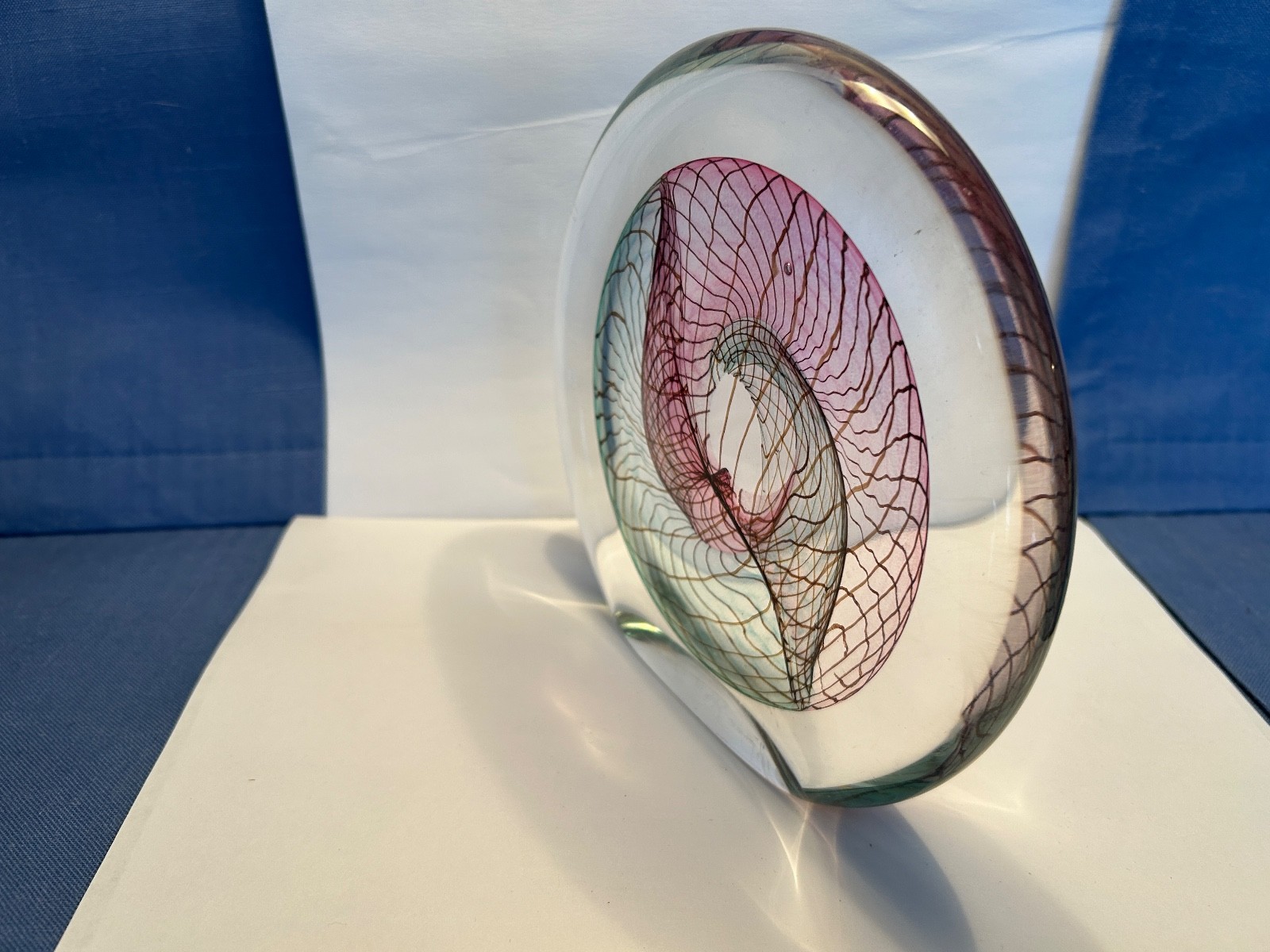 SIGNED ART GLASS FROM THE 1990S WITH PURPLE, GREENS AND LIGHT BROWN VEINING