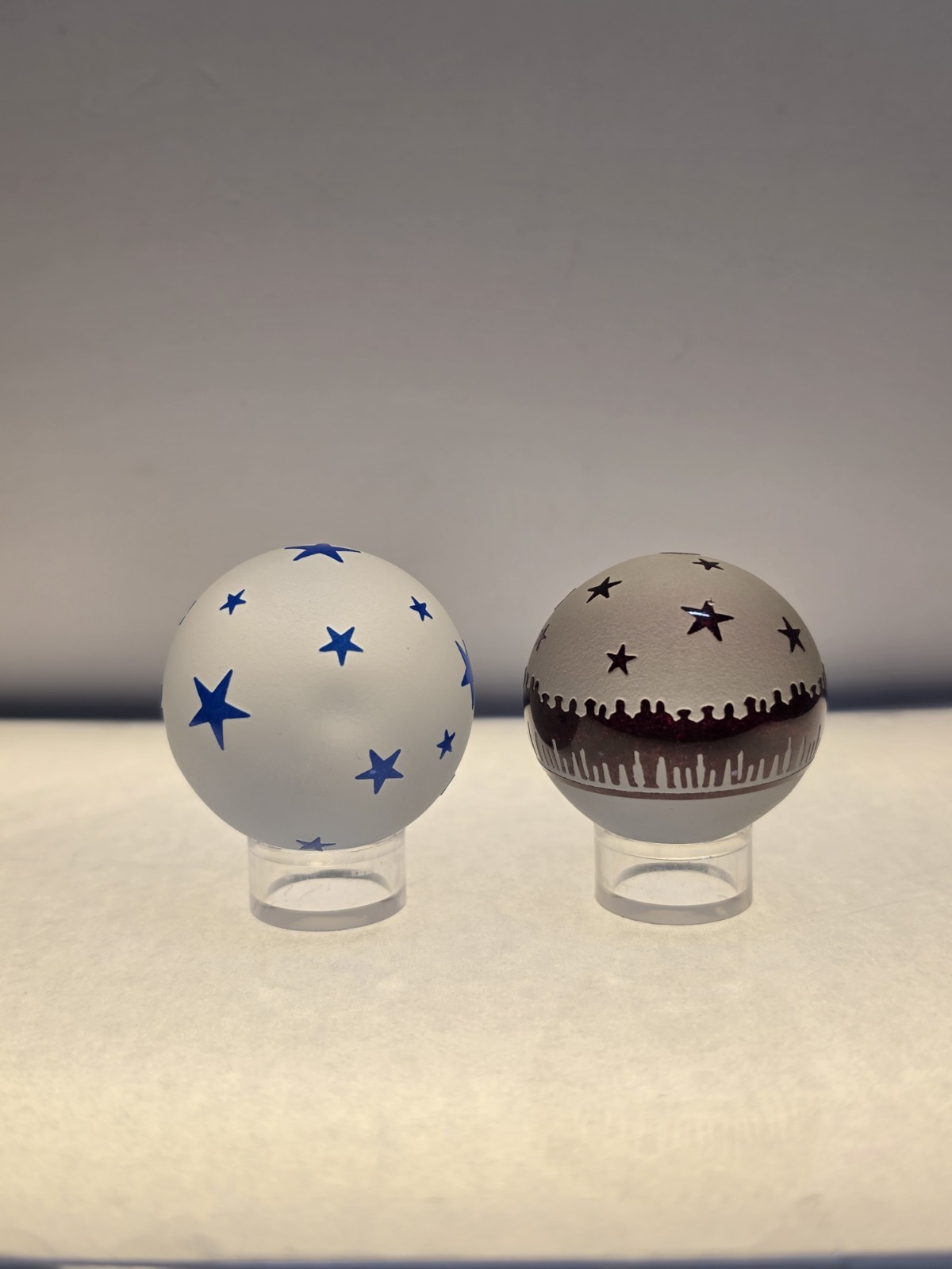 Pair Of Harry Bessett Frosted Cameo Marbles Paperweights Blue Stars and Unity