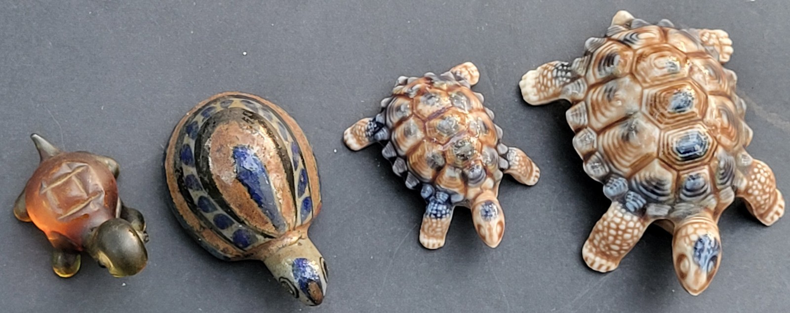 4 Turtles – 2 are Porcelain by Wade, 1 is made of Pottery, 1 is made of Glass