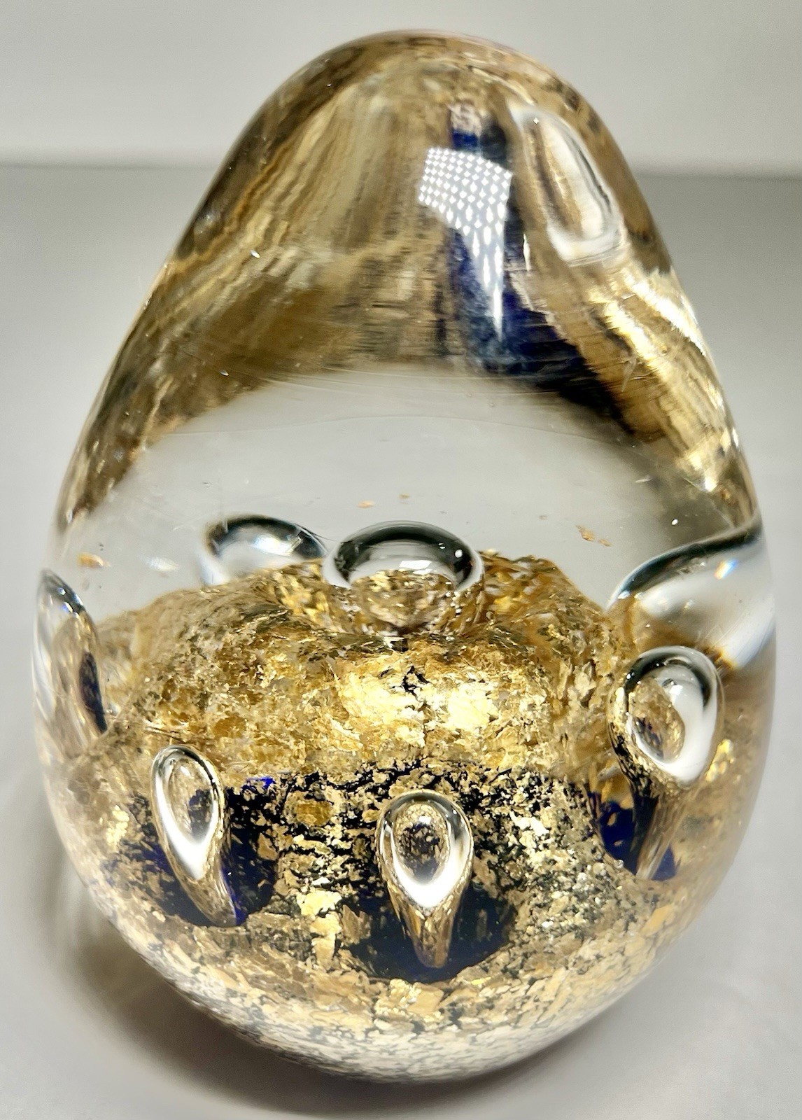 Art Glass Paperweight Gold Leaf Flakes Clear Bubble w Blue Interior 4″ Egg Shape