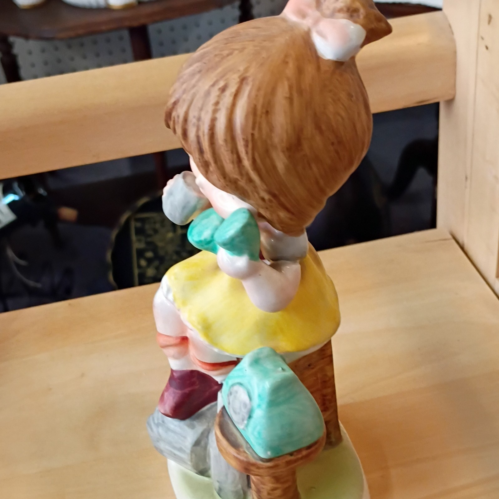 Ceramic Girl Figurine with Telephone Yellow Dress Glossy Decorative Collectible
